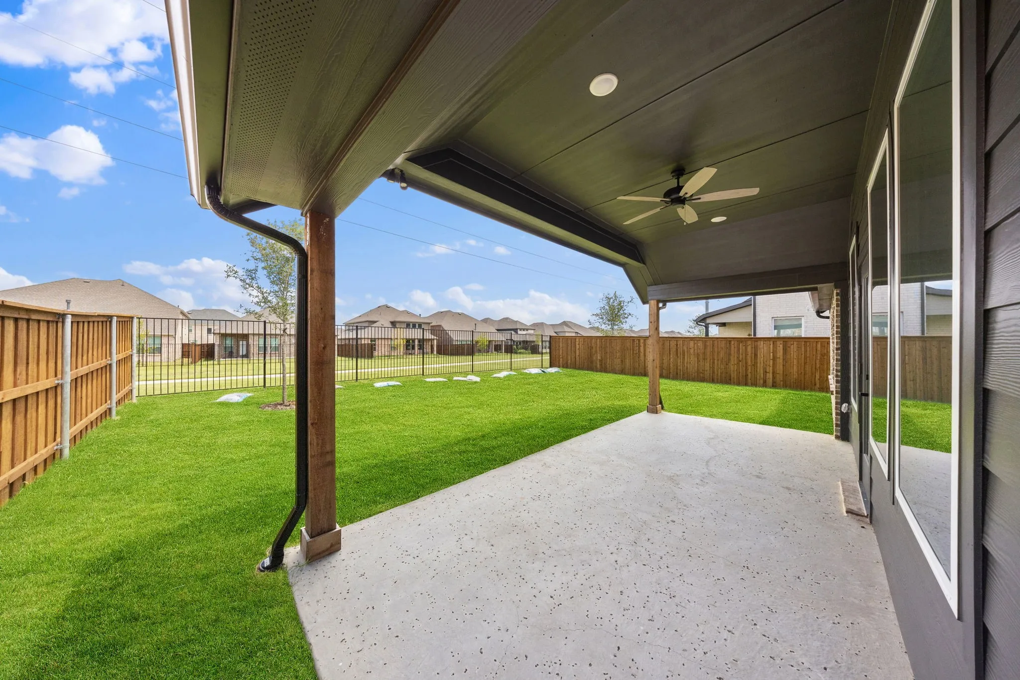 You'll enjoy family bbq's all summer long in this fenced back yard with spacious covered patio!