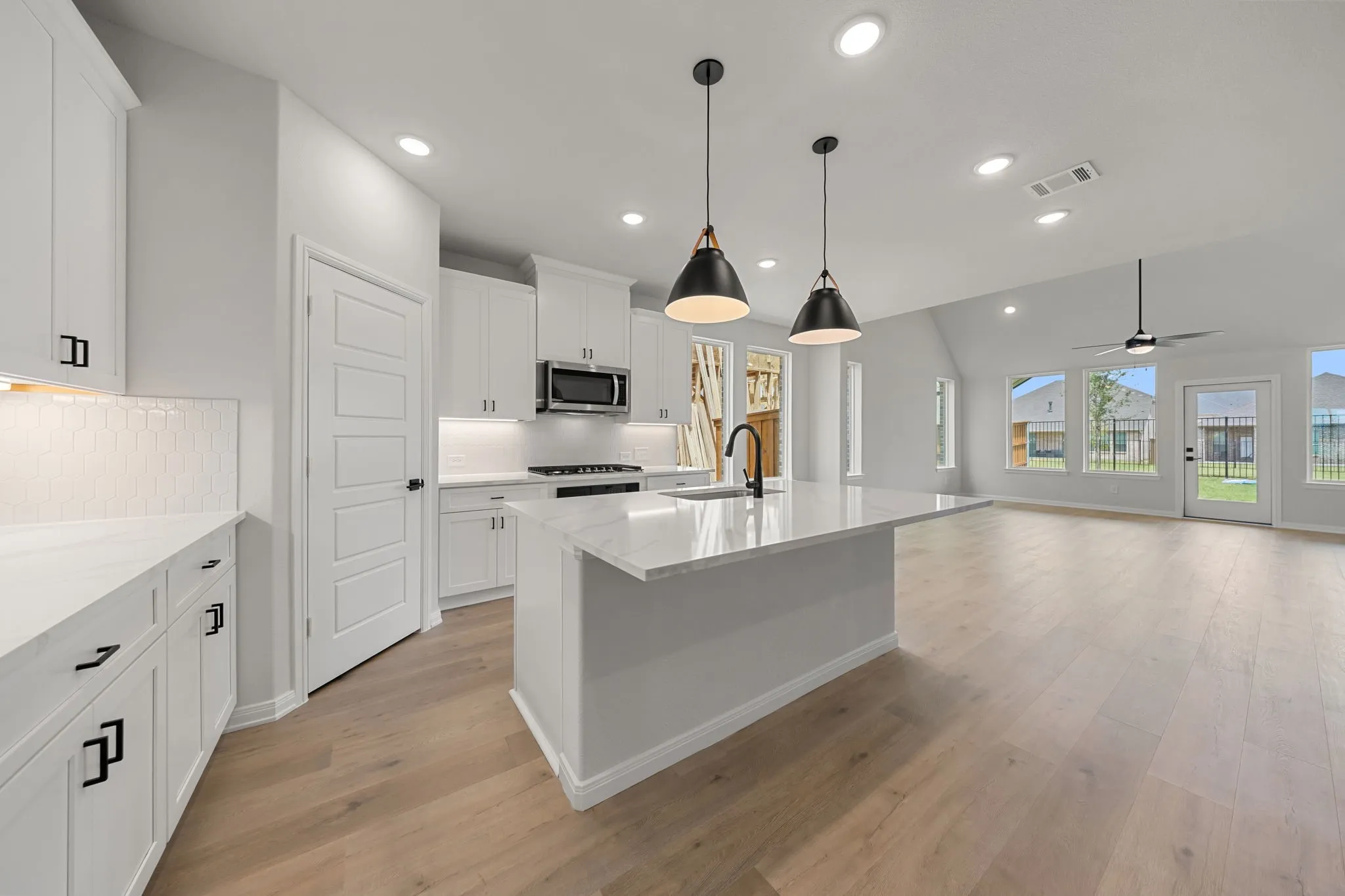 The dining and family rooms are open to the kitchen creating a home that was designed for entertaining!