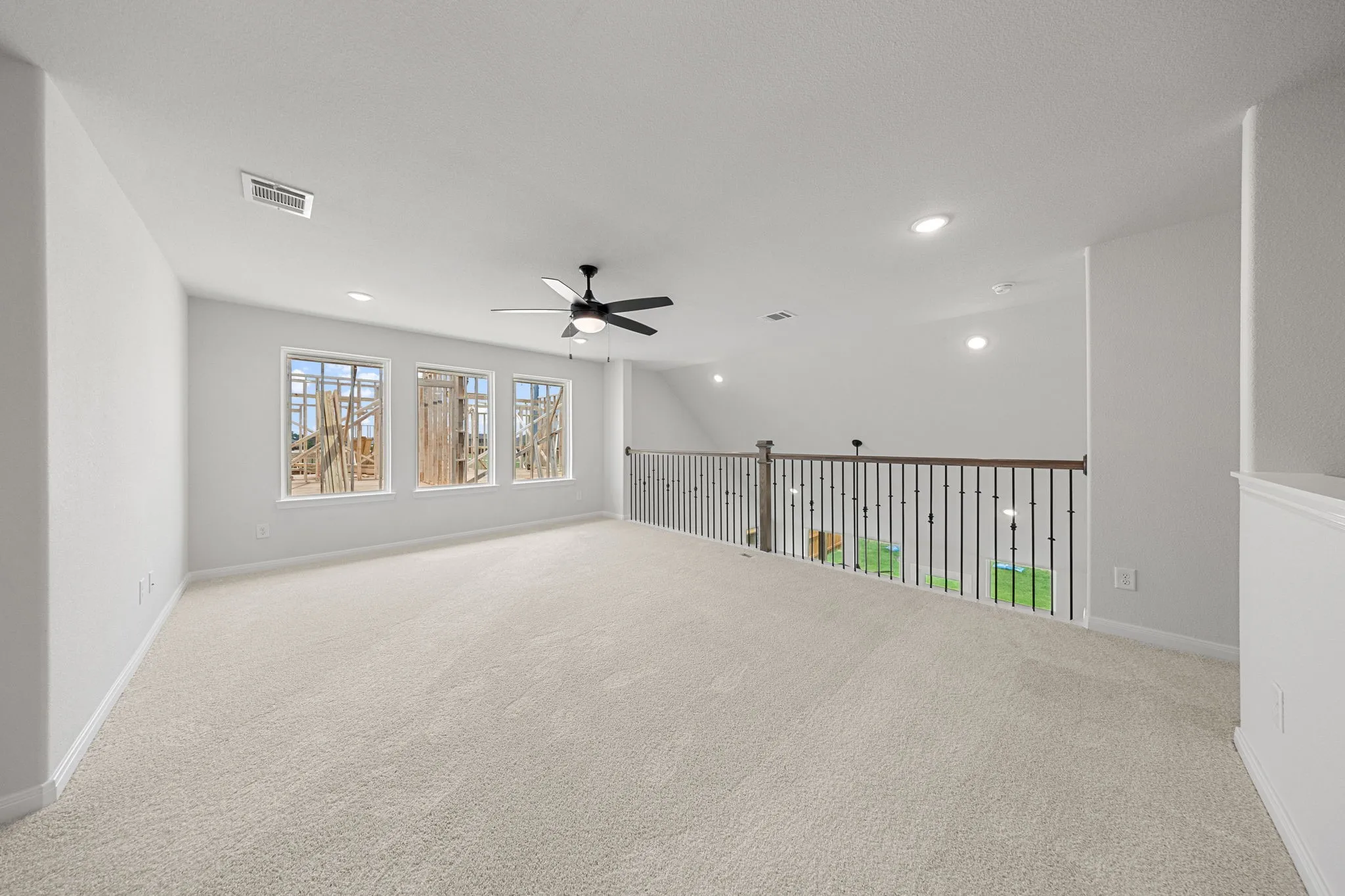 Light, bright and airy, the family fun time never ends in this over the top game room!