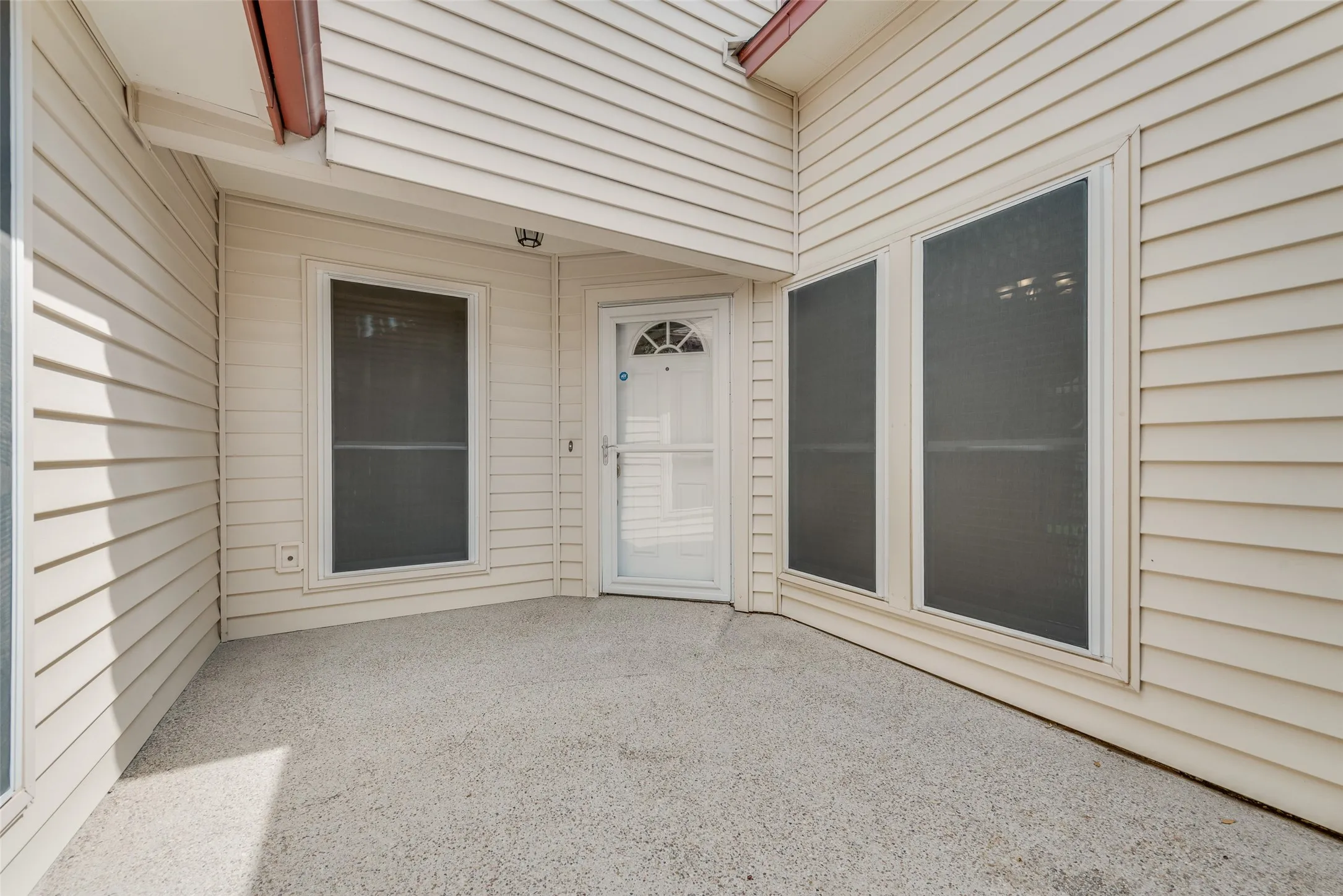 Gated courtyard leading to front door