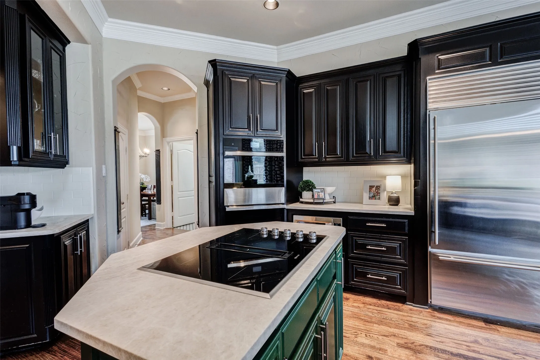Jenn Air Cooktop and Double Oven.  Sub Zero Fridge