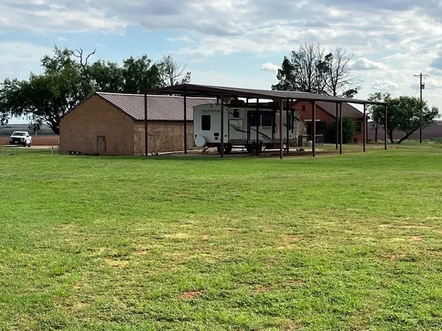 back corner toward the house and outbuildings