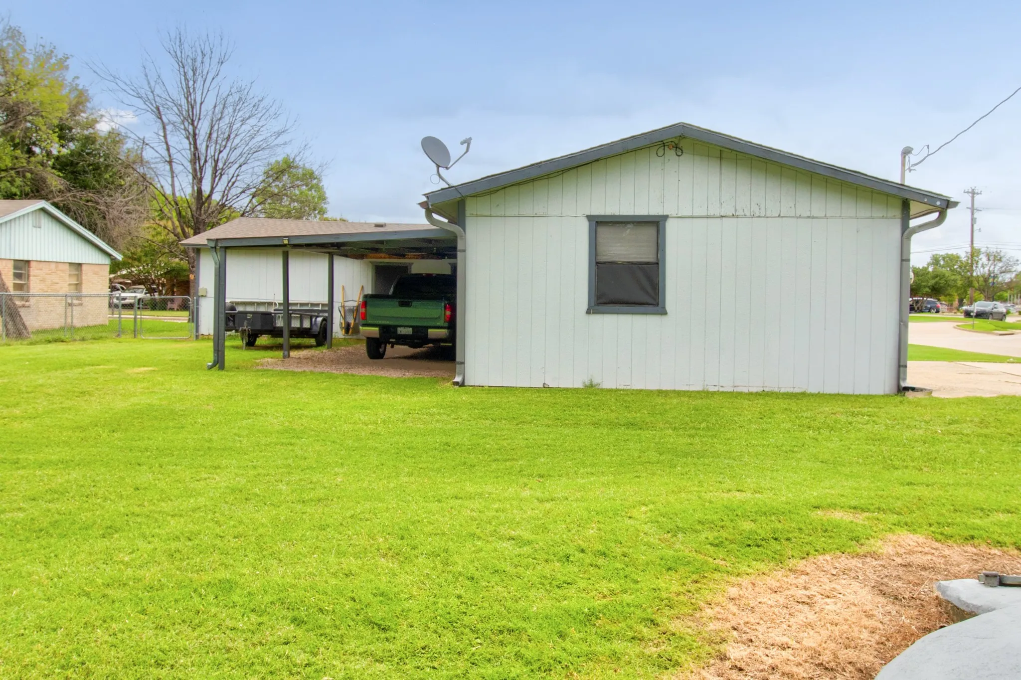 Side view, with carport.