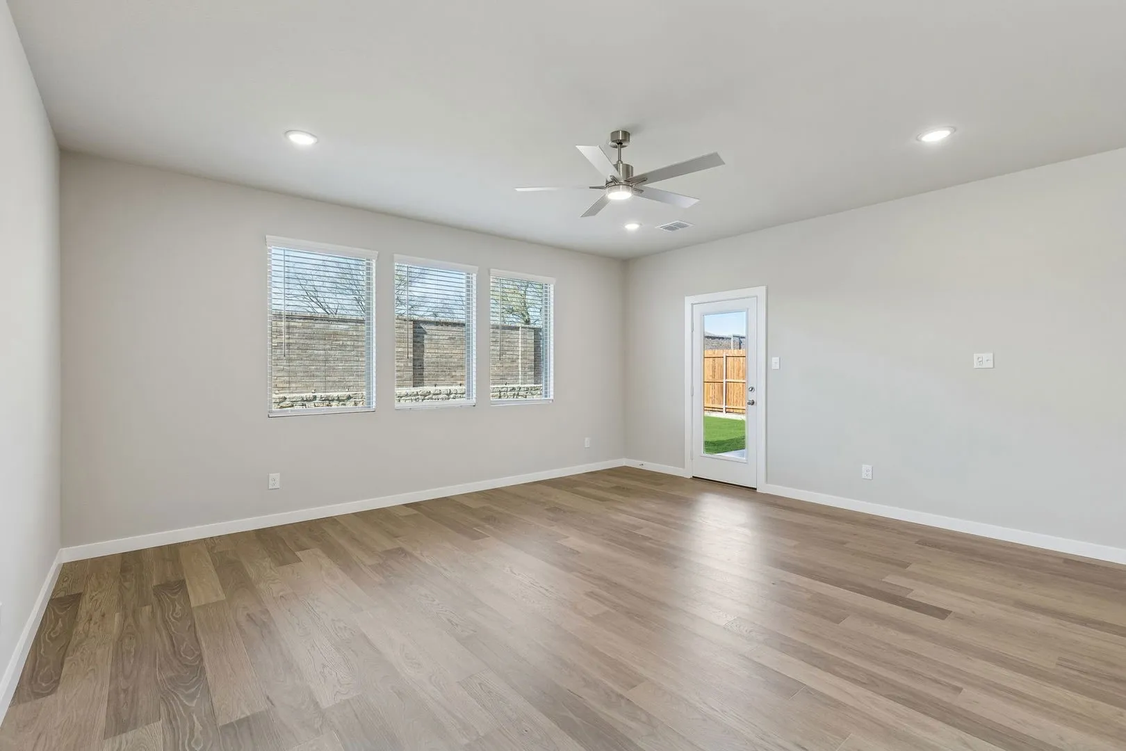 Living Room in the Holden home plan by Trophy Signature Homes – REPRESENTATIVE PHOTO