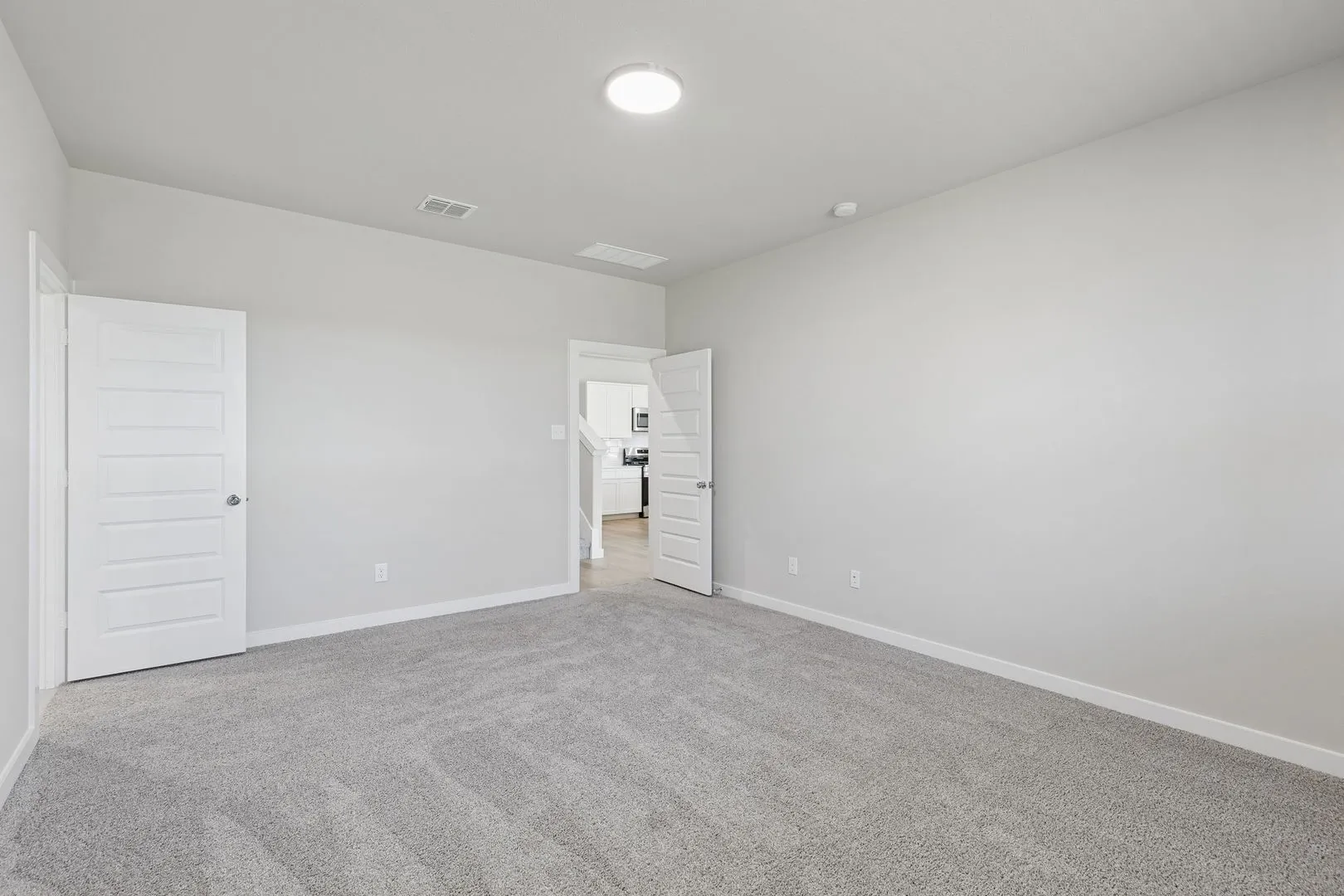 Primary Suite in the Holden home plan by Trophy Signature Homes – REPRESENTATIVE PHOTO