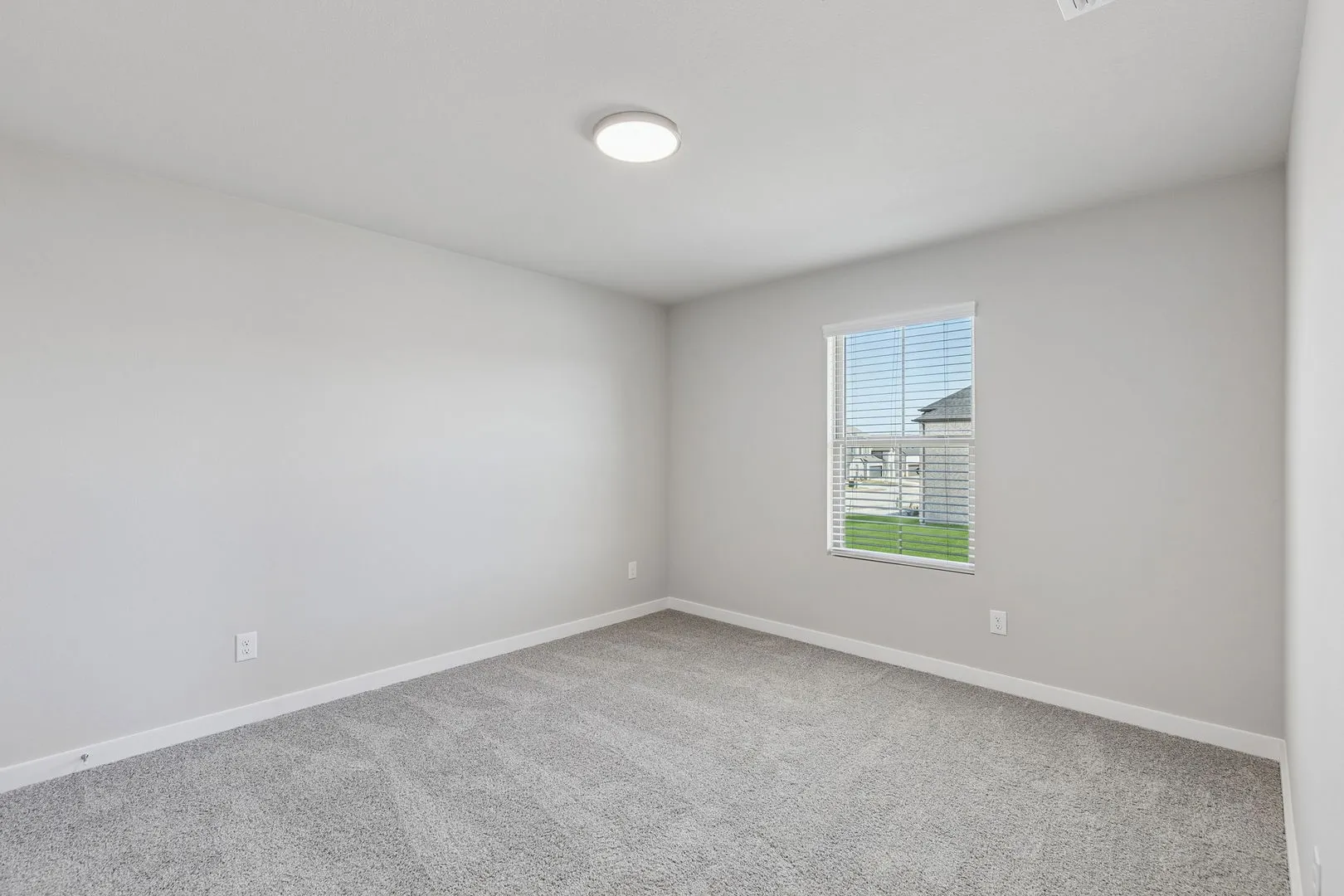 Bedroom in the Holden home plan by Trophy Signature Homes – REPRESENTATIVE PHOTO