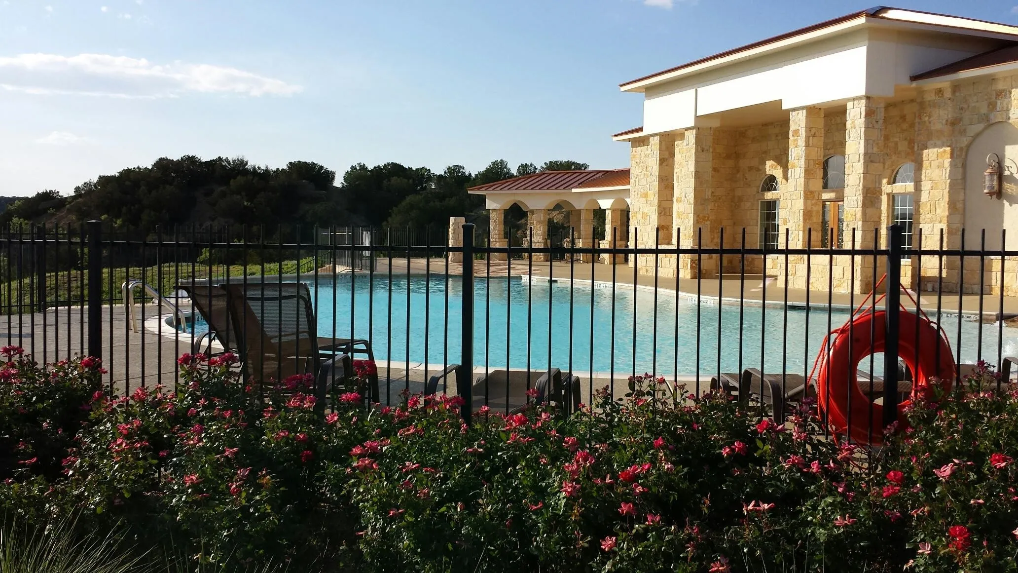 Gorgeous community clubhouse swimming pool overlooks the NE side of PK Lake.