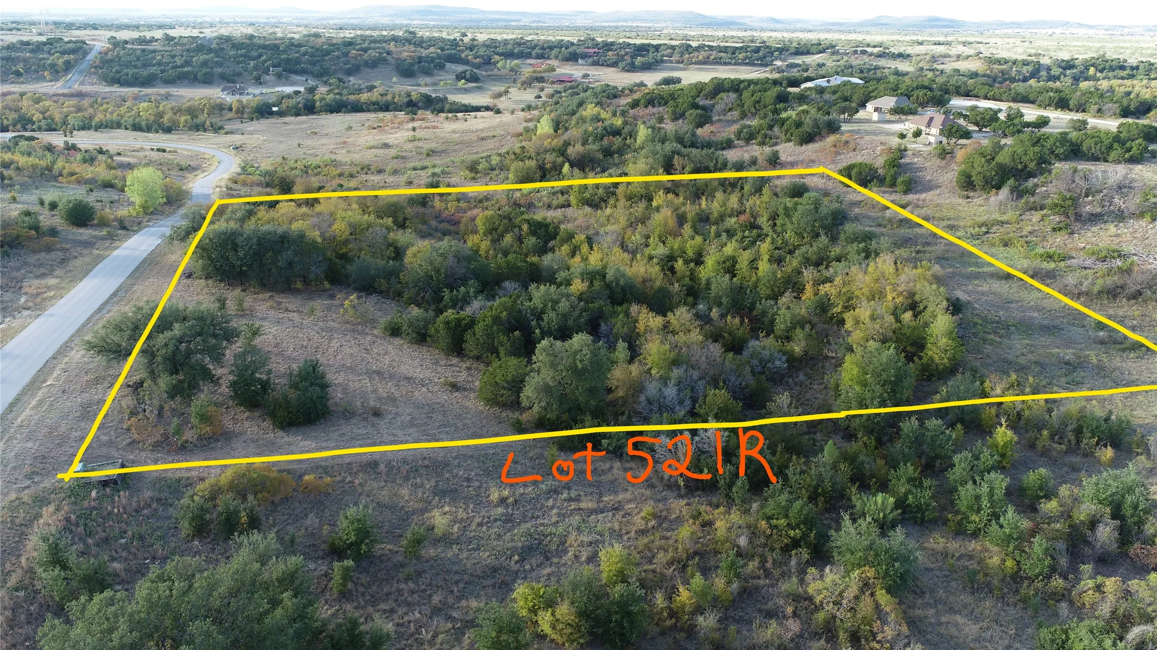 Create your own Lake Oasis on this large treed lot at The Hills above PK Lake.