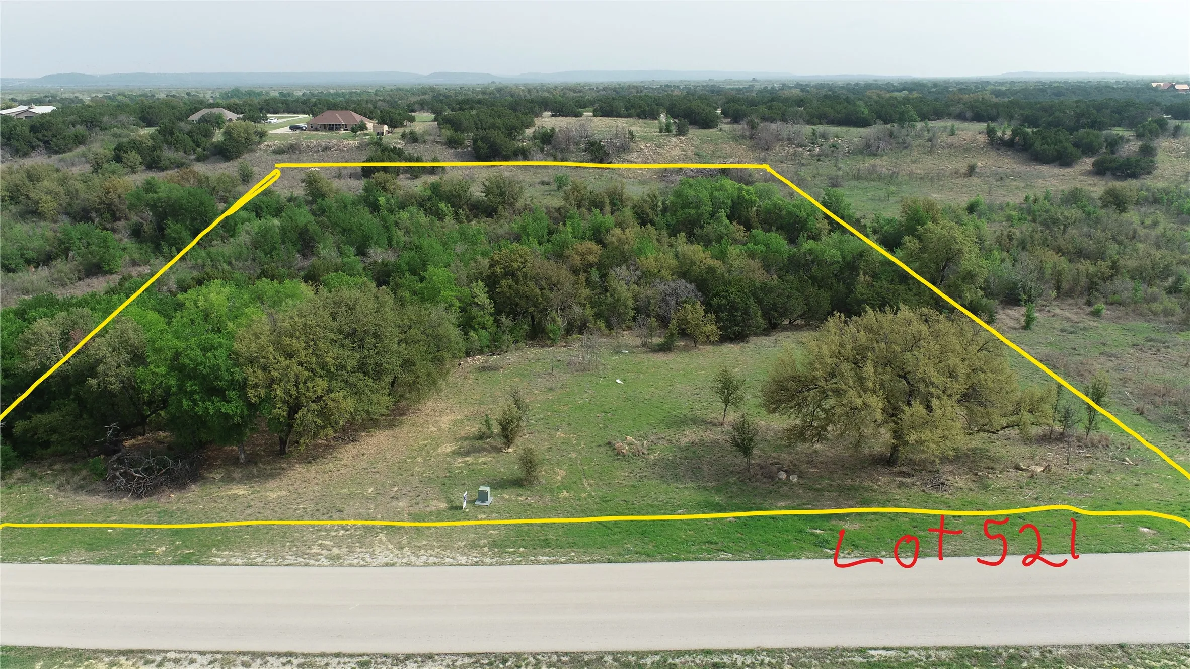Lot 521R Canyon Wren as seen from the street.  Nice cleared area in front to build a home.
