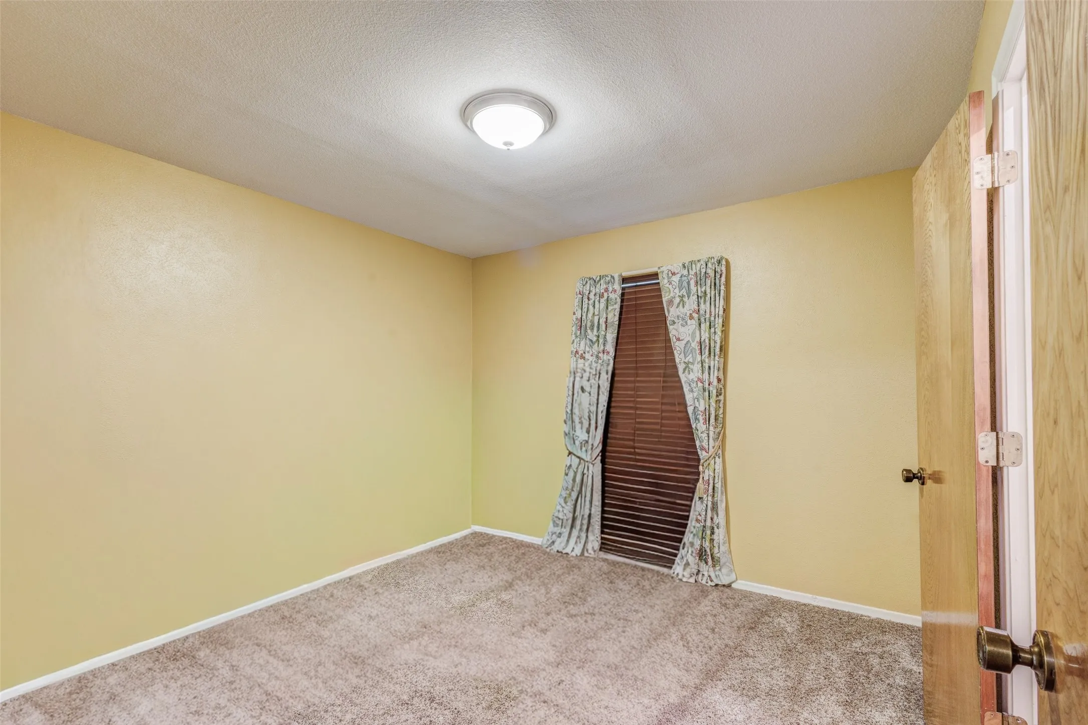 2nd Bedroom on opposite side of the house with bathroom around the corner.
