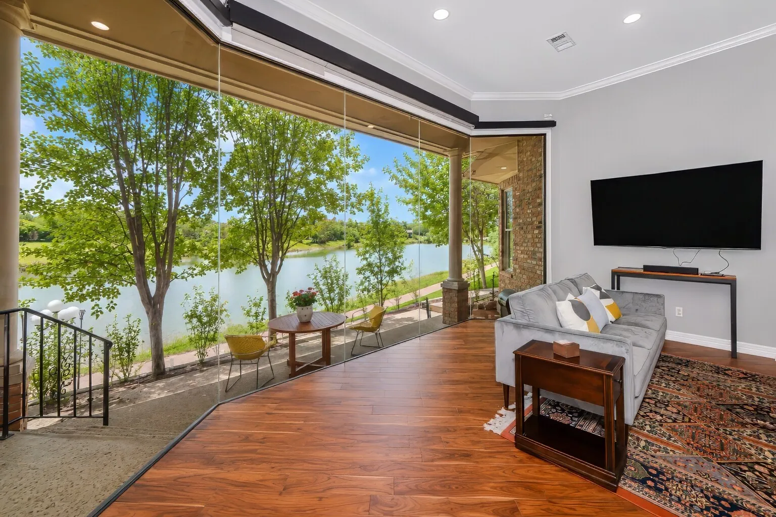 Additional view from kitchen and great room . Glass windows have electric shades!