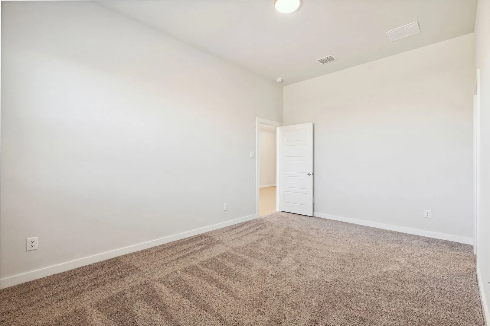Primary Suite in the Ash home plan by Trophy Signature Homes – REPRESENTATIVE PHOTO