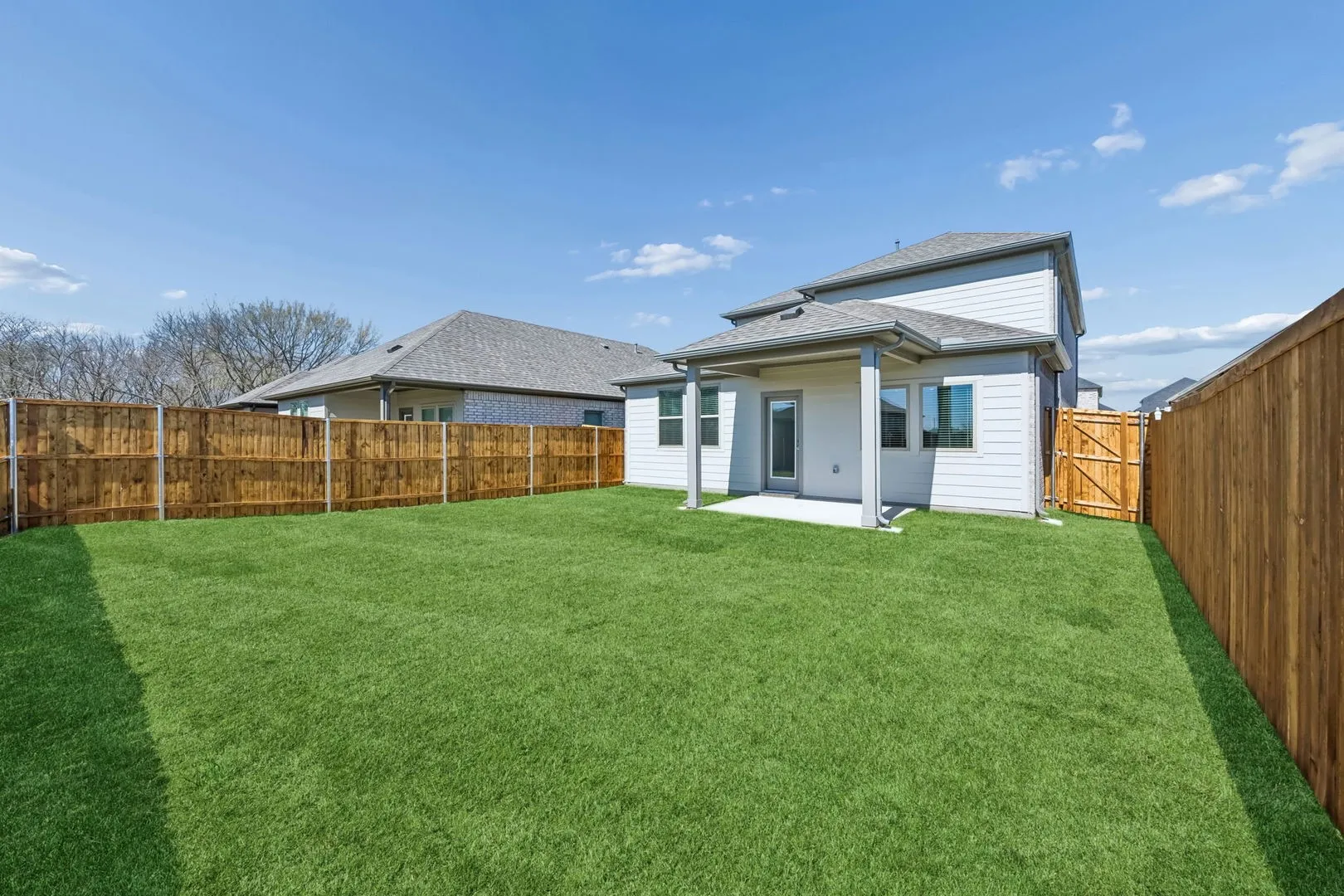 Covered Patio in the Mesquite home plan by Trophy Signature Homes – REPRESENTATIVE PHOTO