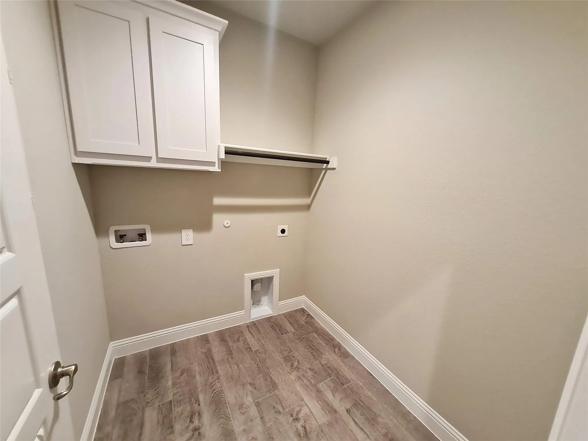 Laundry Room with Washer & Electric Dryer Hook-up.