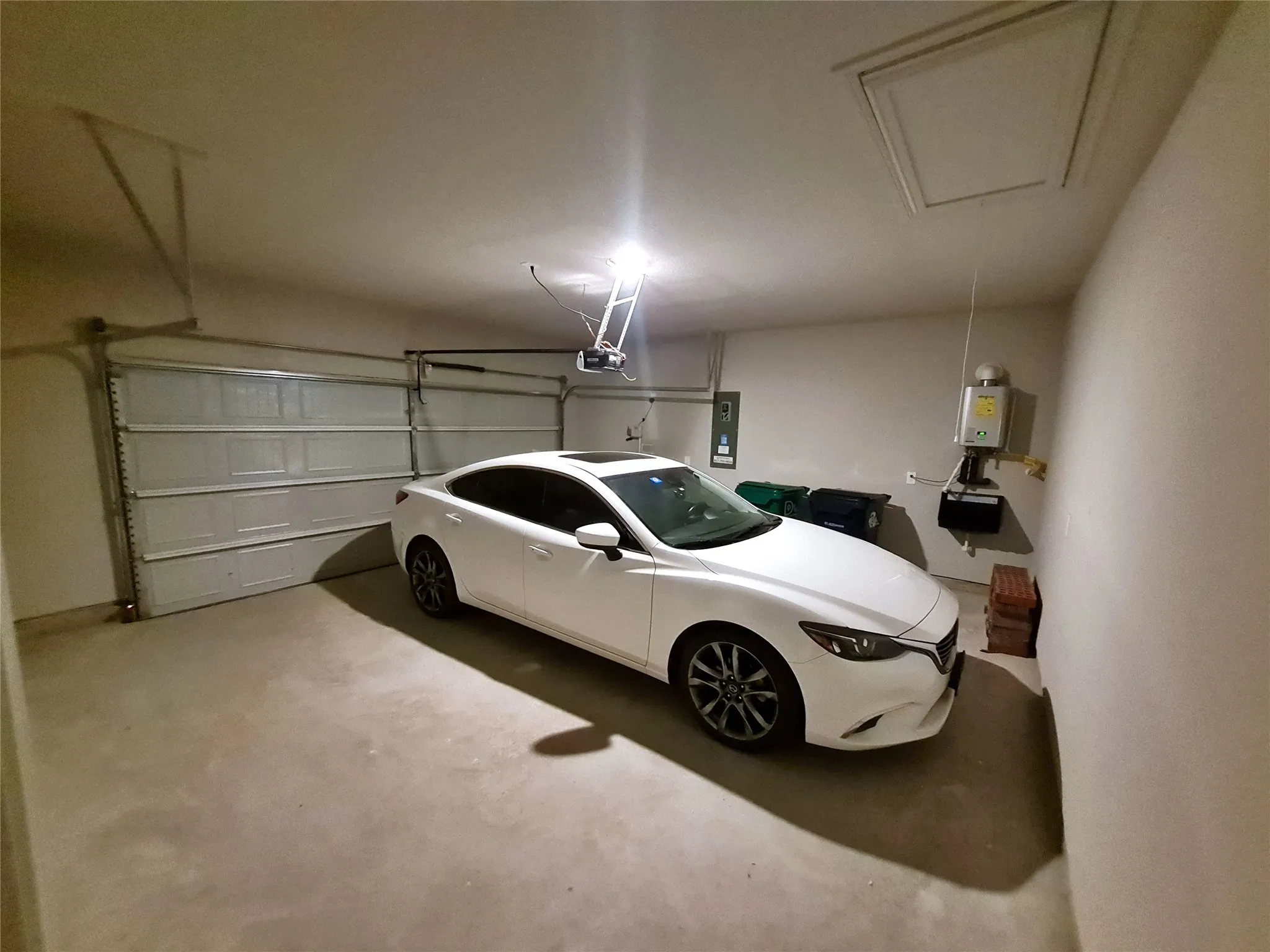 2 Car Garage. Instant Hot-Water Heater.
