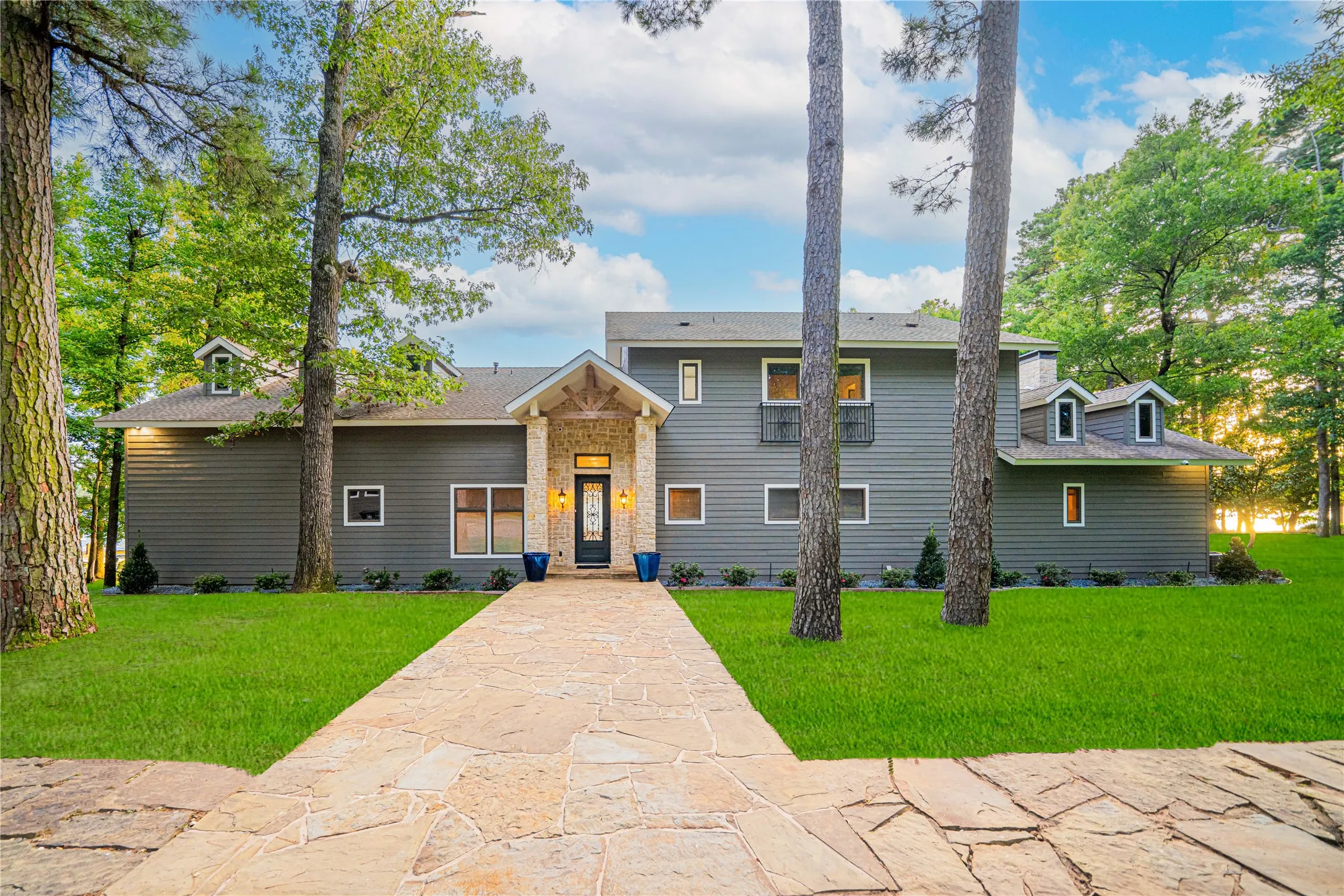 View of front of home featuring a front lawn