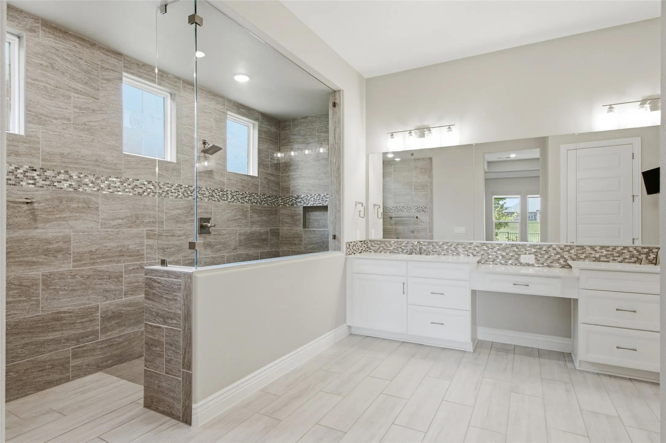 Curb Less shower with seat for comfort.