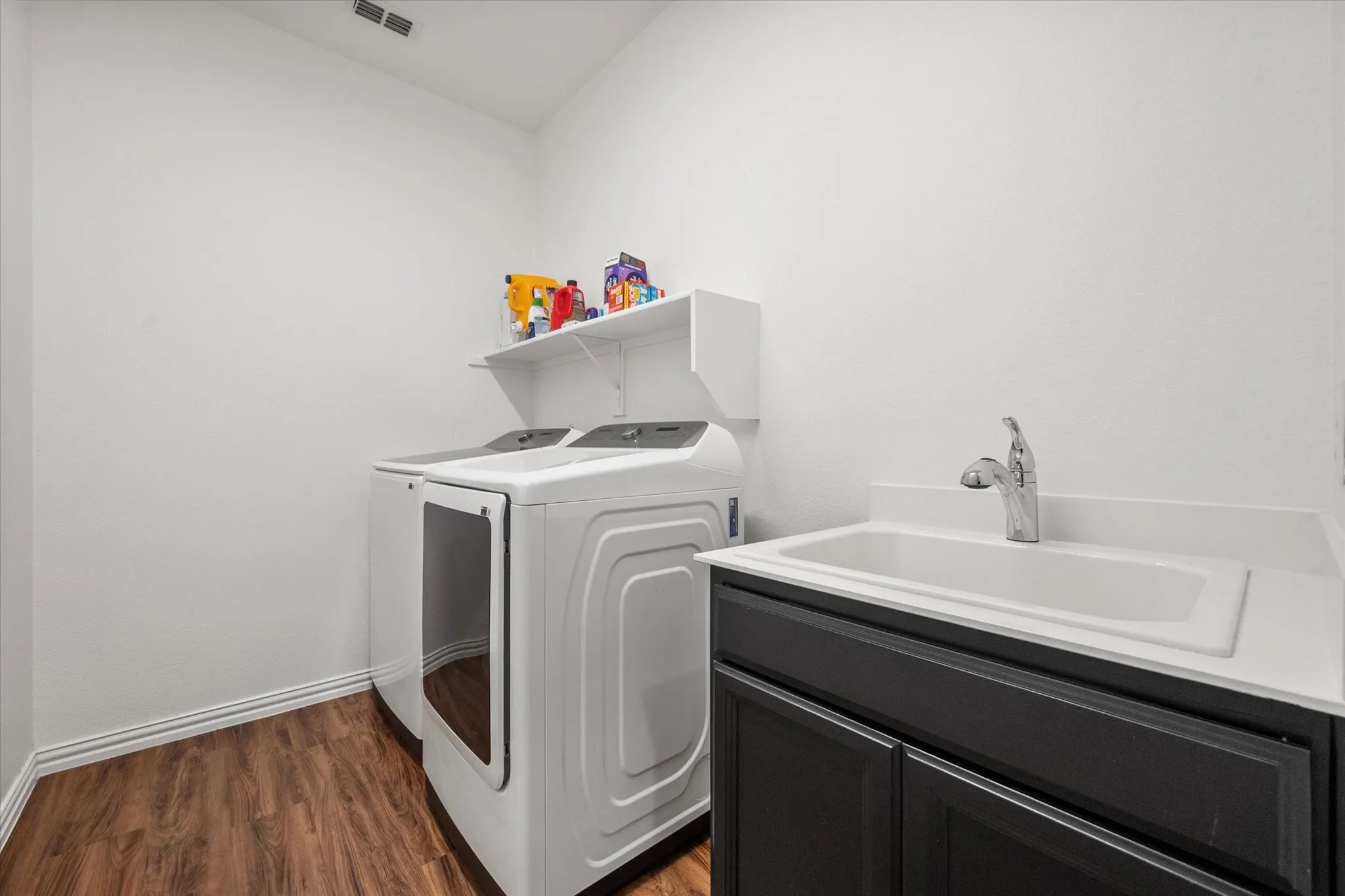 Dedicated laundry room with utility sink