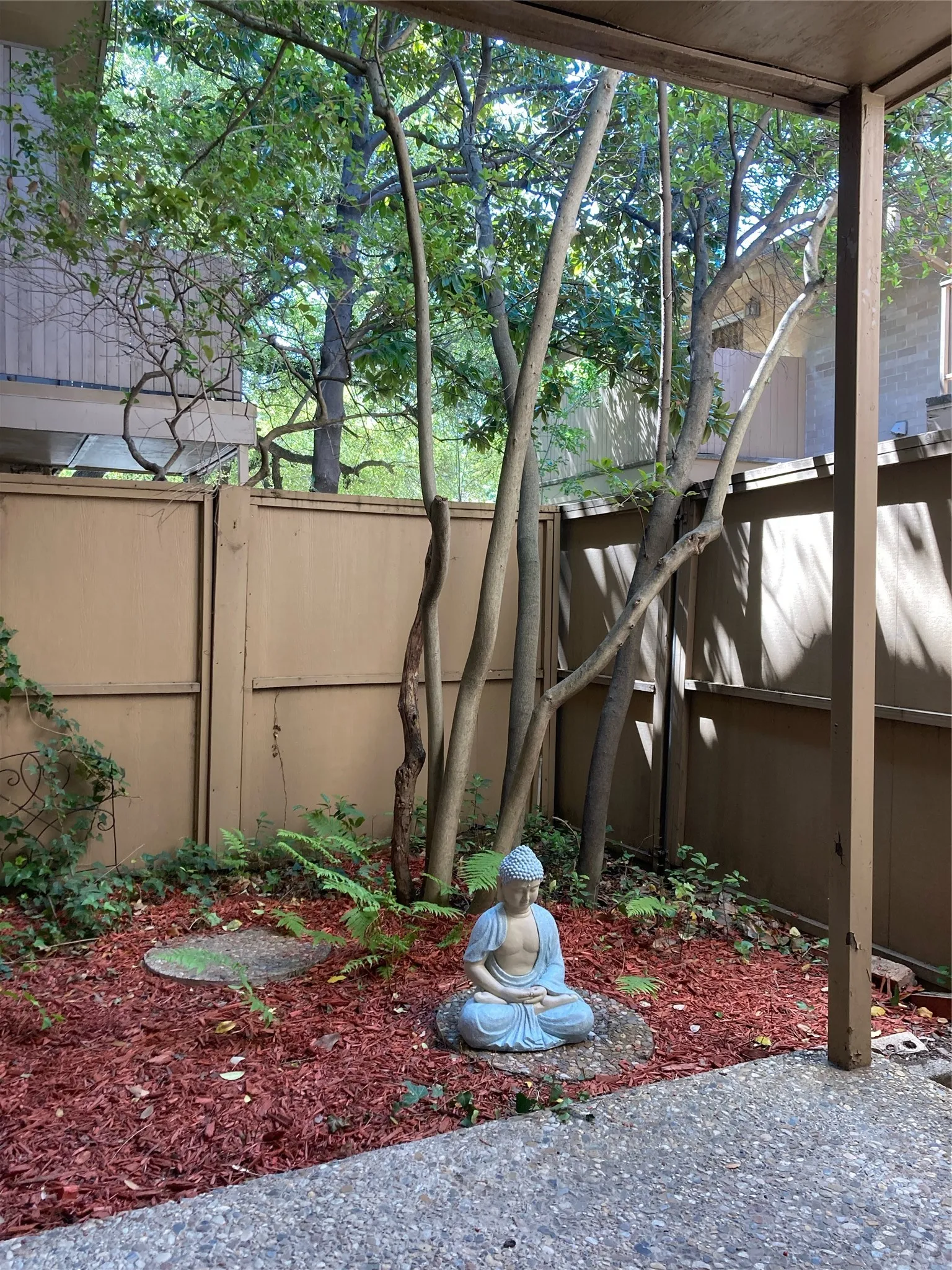 Private garden patio with primary suite access