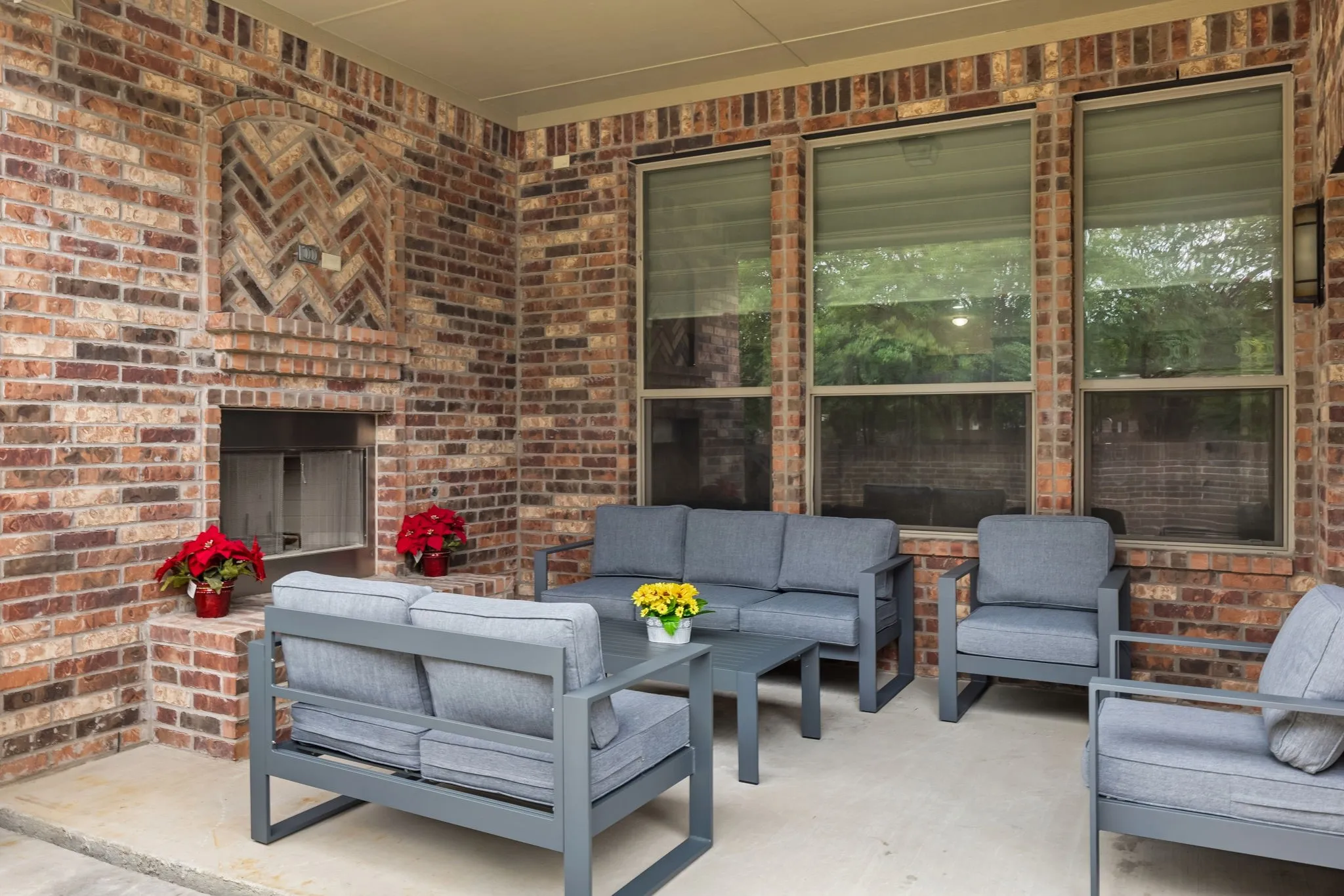 Lovely covered patio with fireplaceLovely covered patio with fireplace