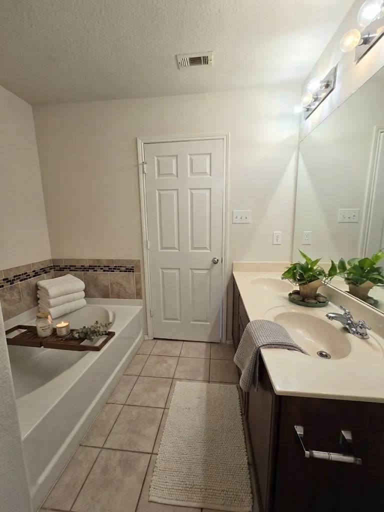 Dual vanity with integrated sinks and a neutral countertop