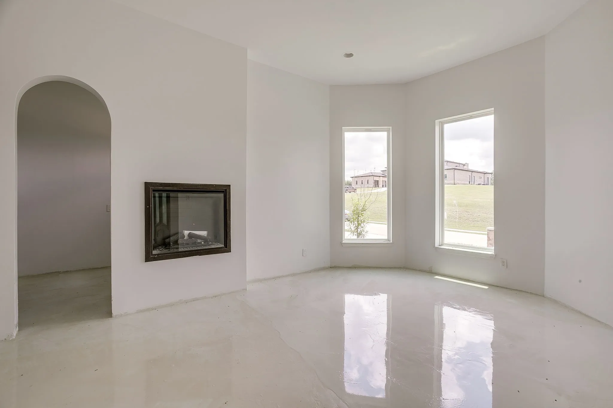 No flooring, electric fireplace