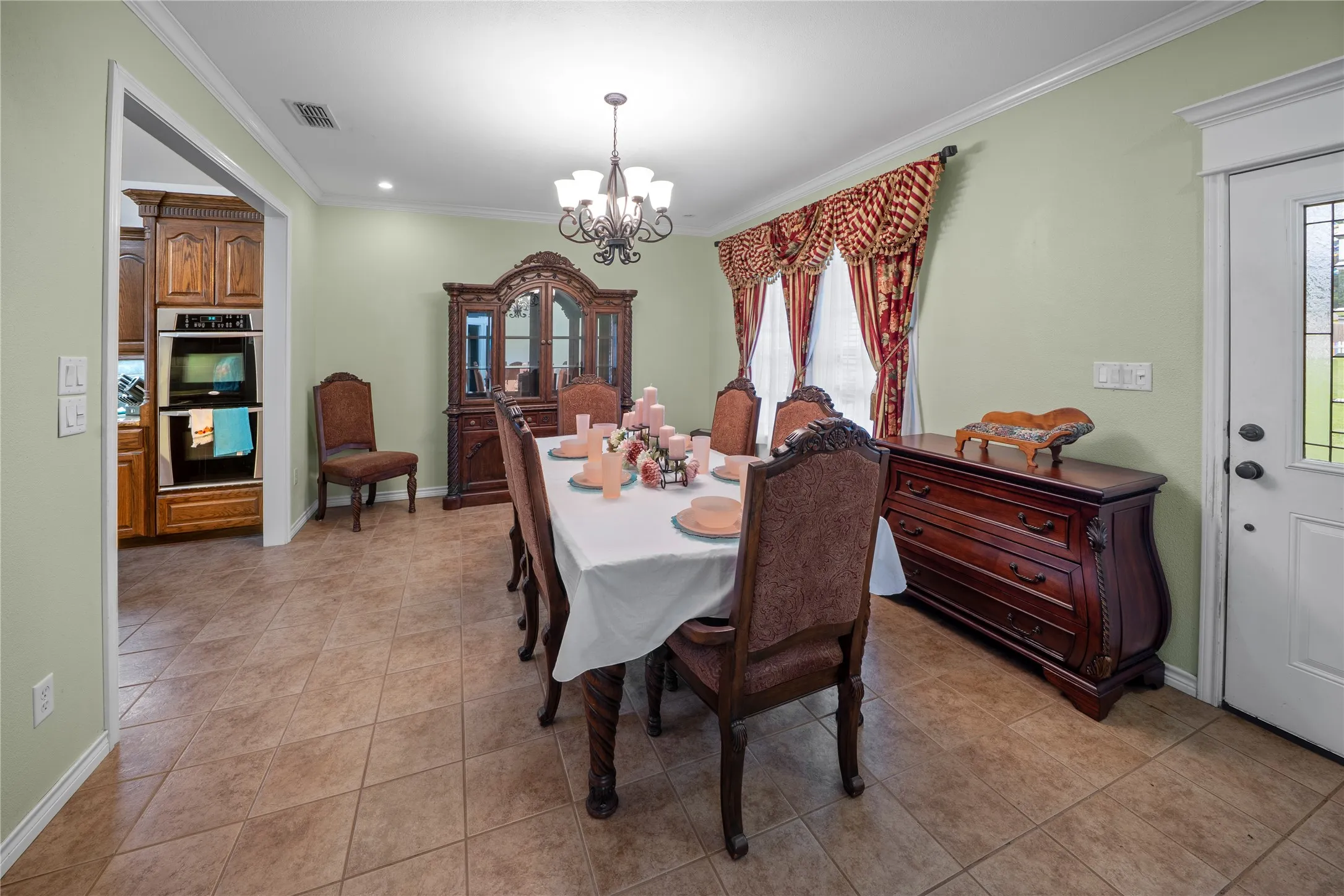 Plenty of space in the dining area for buffets and hutches