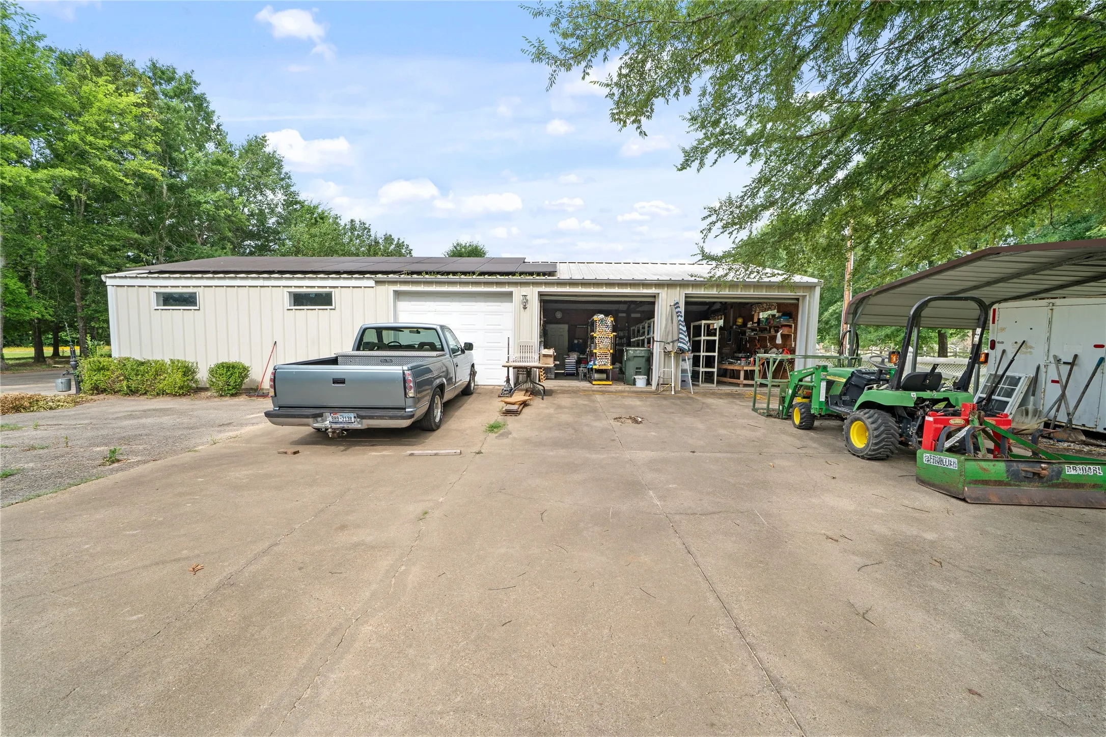 3 overhead doors with additional sheetrocked workspace