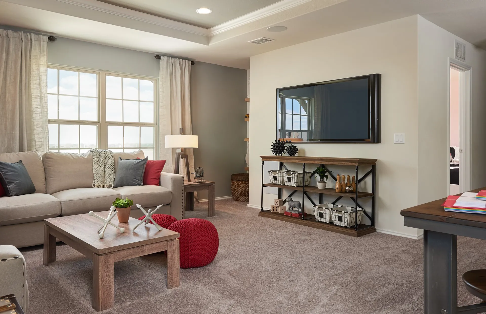 *Model Representation - Spacious gathering room with large windows