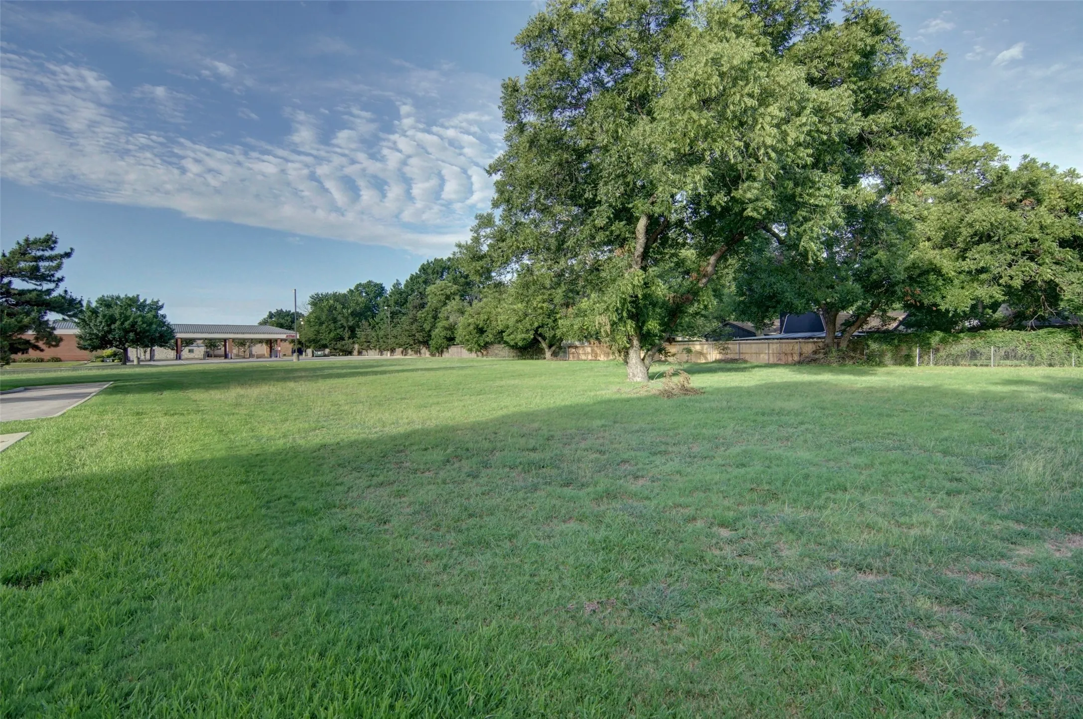 View looking south to the shared access driveway and the neighboring bank.