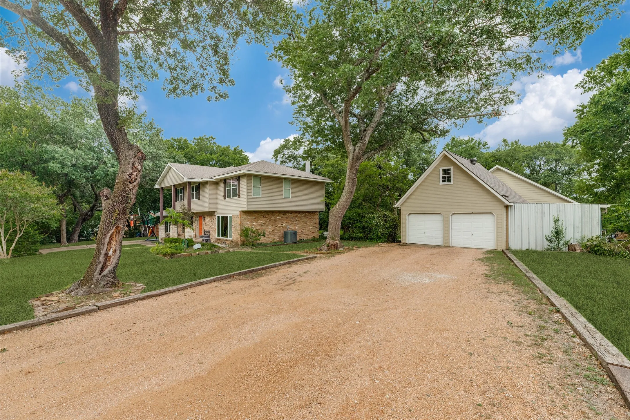 FRONT YARD AND DETACHED TWO CAR GARAGE