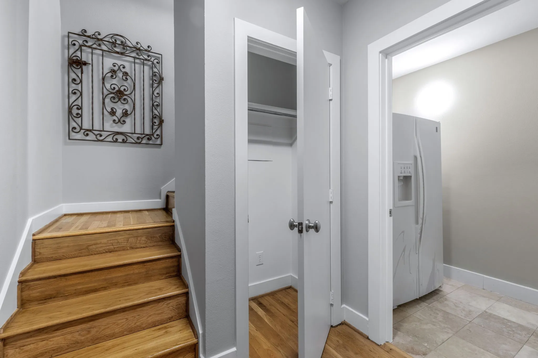 The entrance foyer is accessed from the 7th floor. It includes a coat closet and a large storage room.