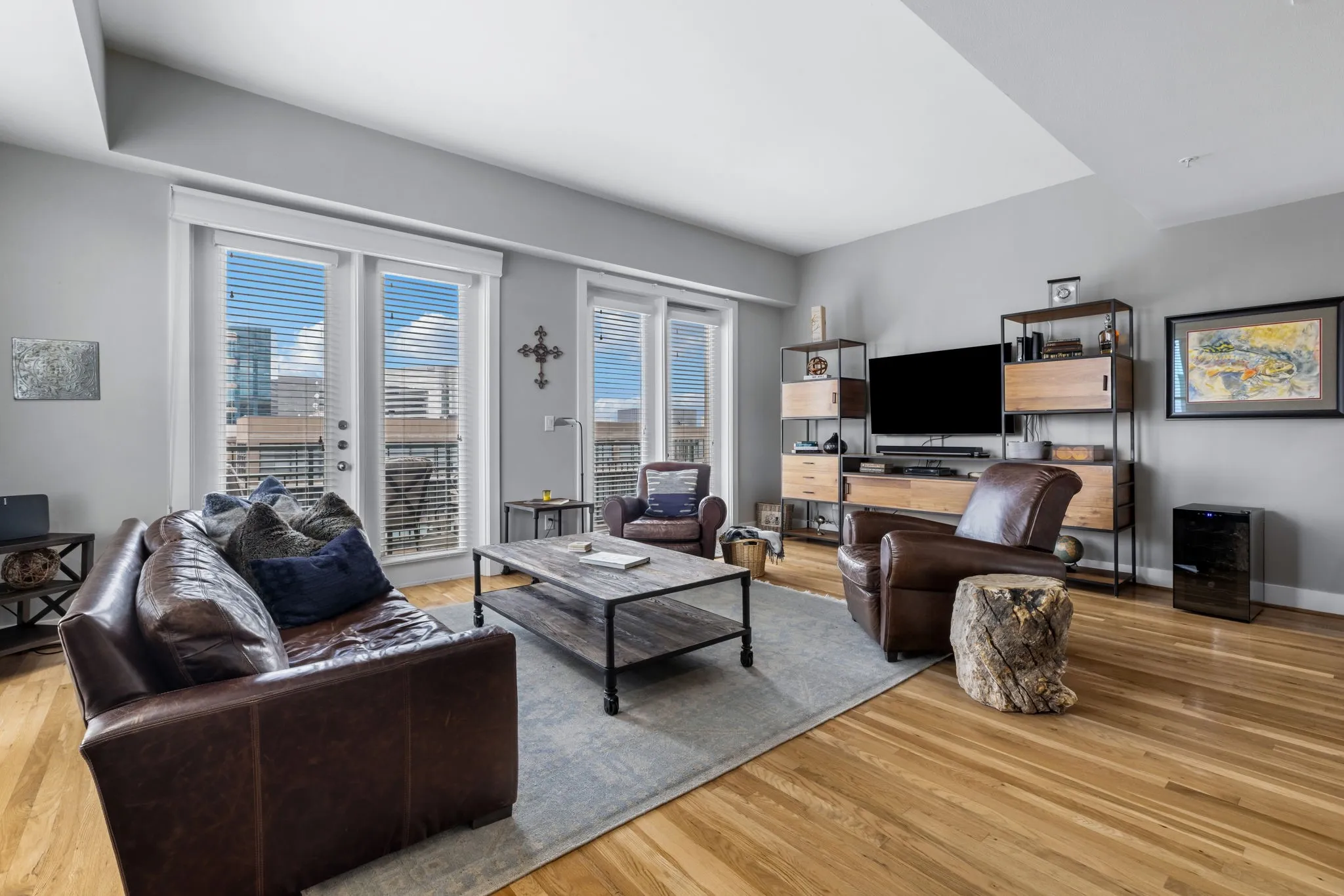 2 sets of patio doors lead to the large front balcony.