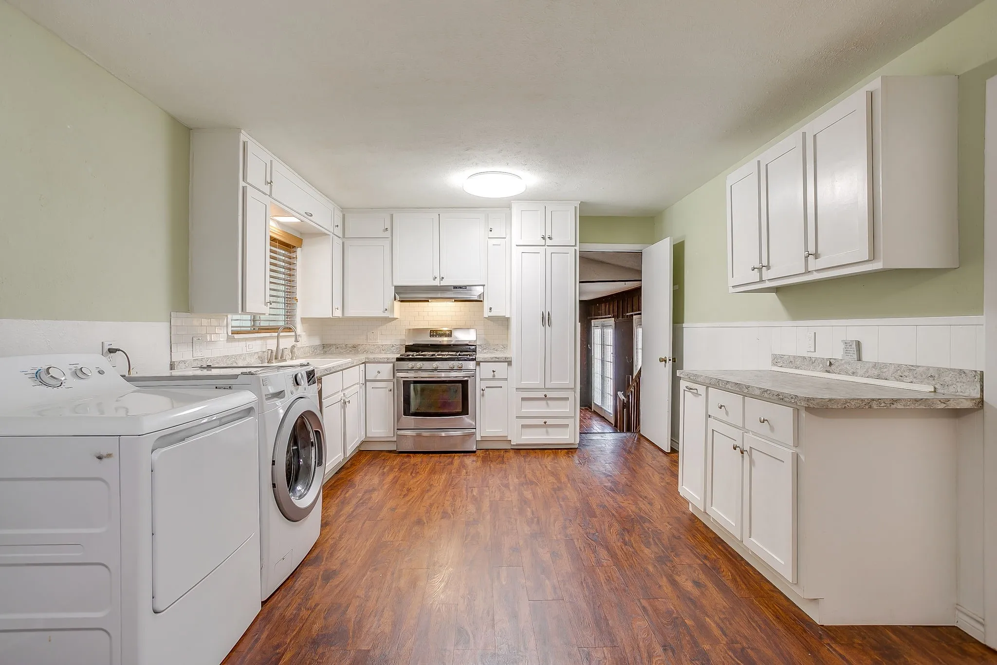 Kitchen & laundry areas.
