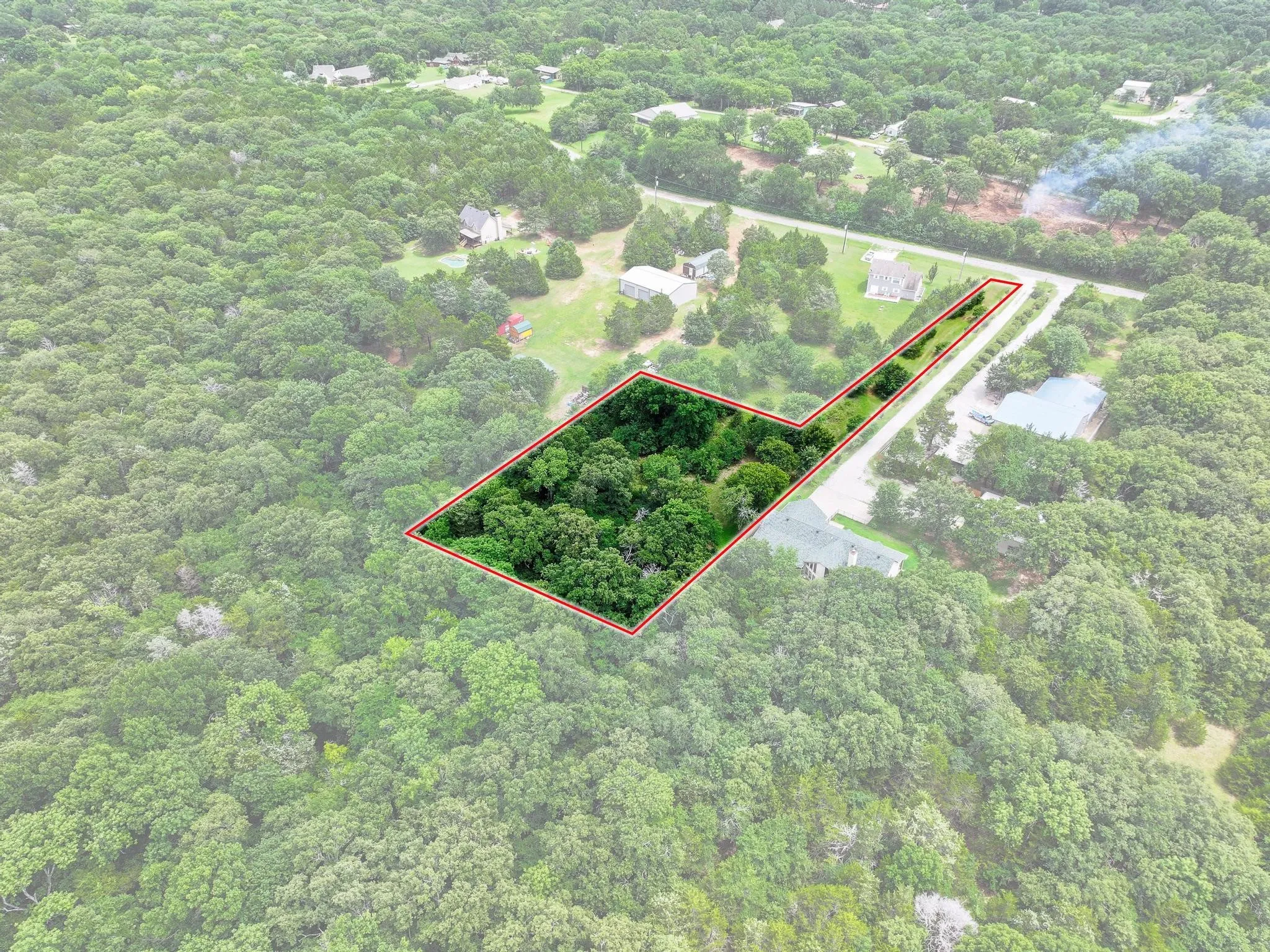 Expansive wooded lot with defined boundaries