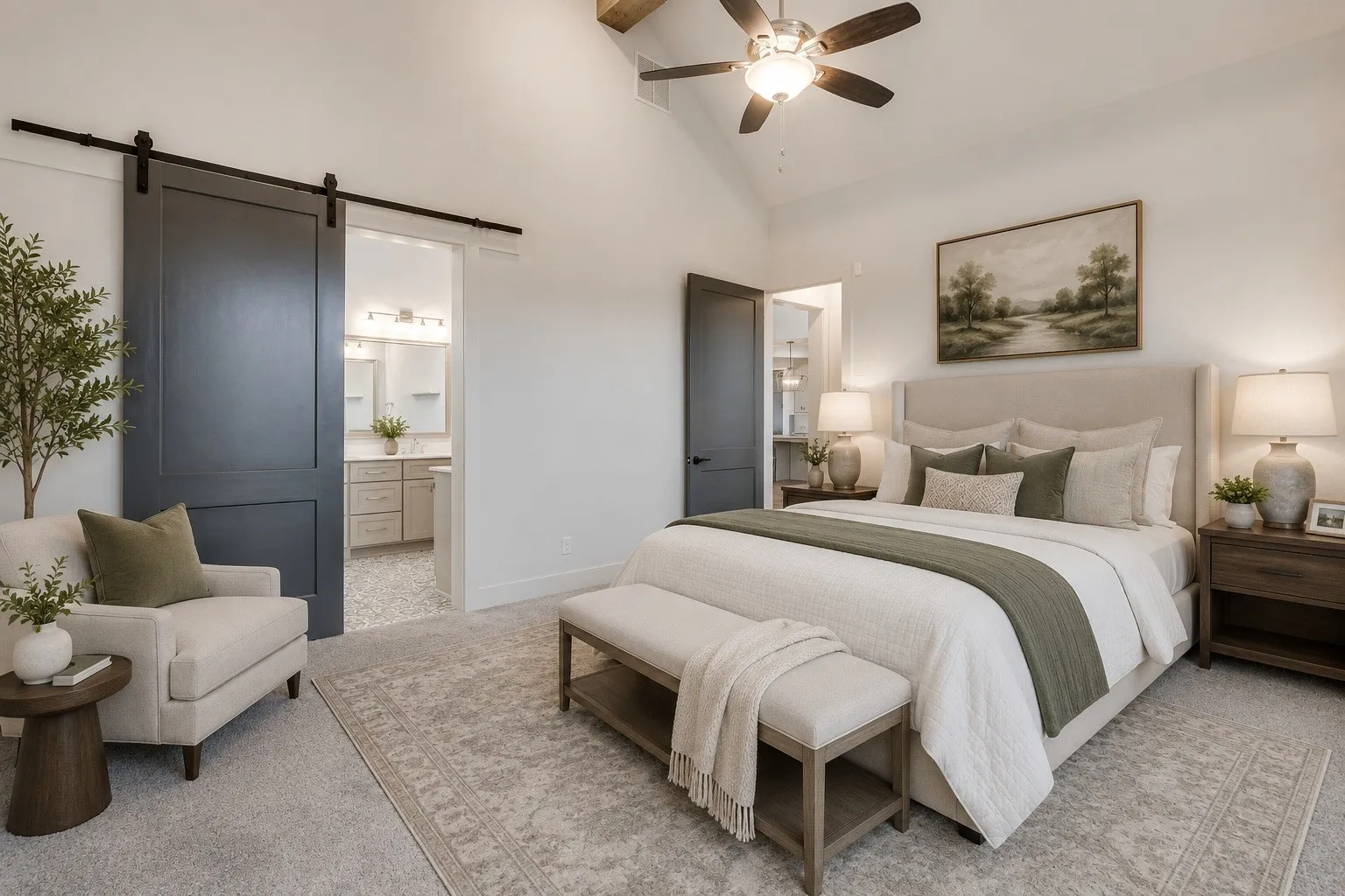 Vaulted ceiling with exposed wood beam and ceiling fan. *Photo virtually staged using AI.