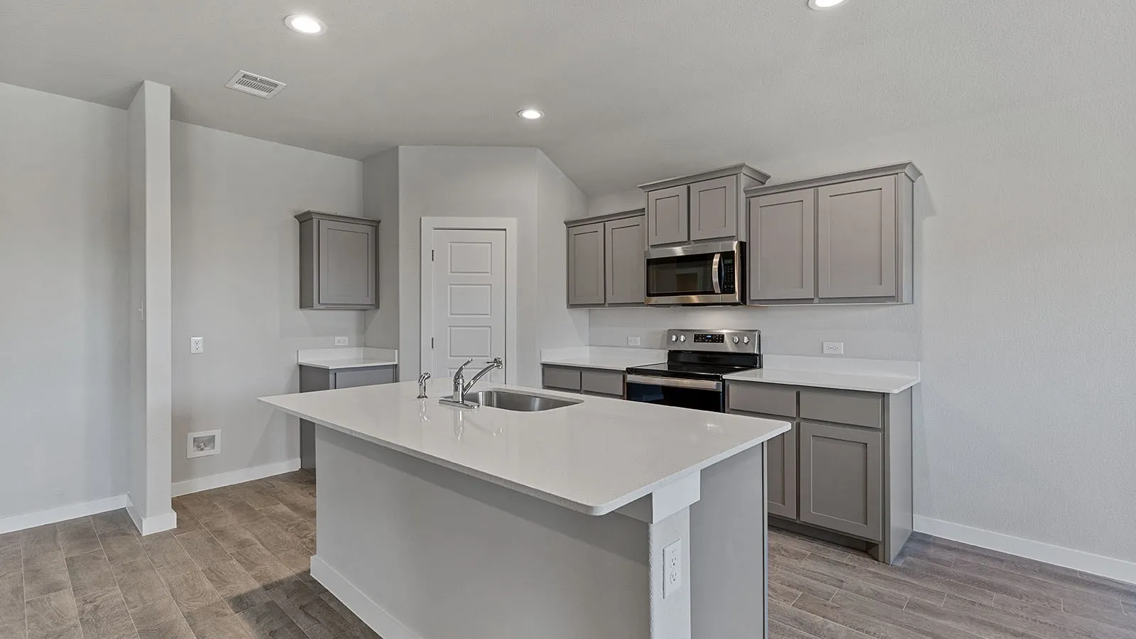 Kitchen- All Home and community information, including pricing, included features, terms, availability and amenities, are subject to change at any time without notice or obligation. All Drawings, pictures, photographs, video, square footages, floor plans, elevations, features, colors and sizes are approximate for illustration purposes only and will vary from the homes as built.