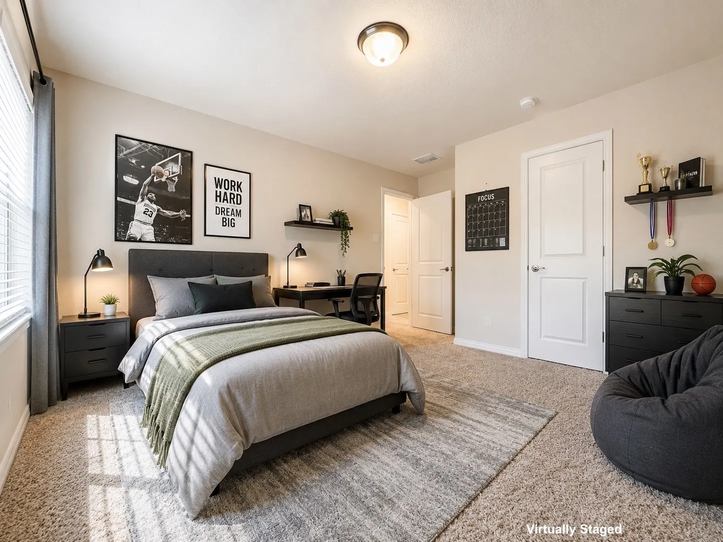 Carpeted bedroom featuring a window with blinds, a ceiling-mounted light fixture, and two interior doors