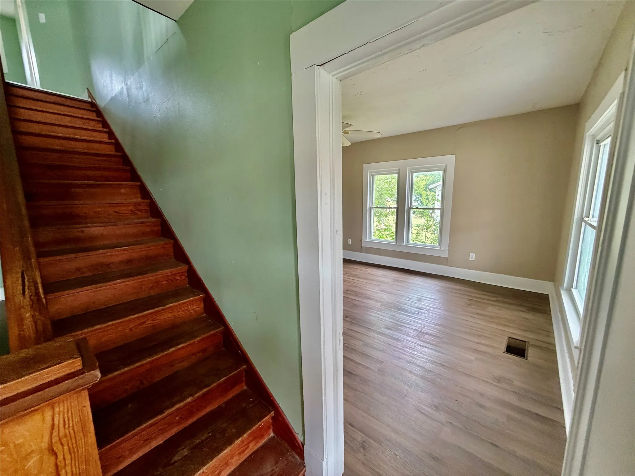Front door entrance with living room to the right.