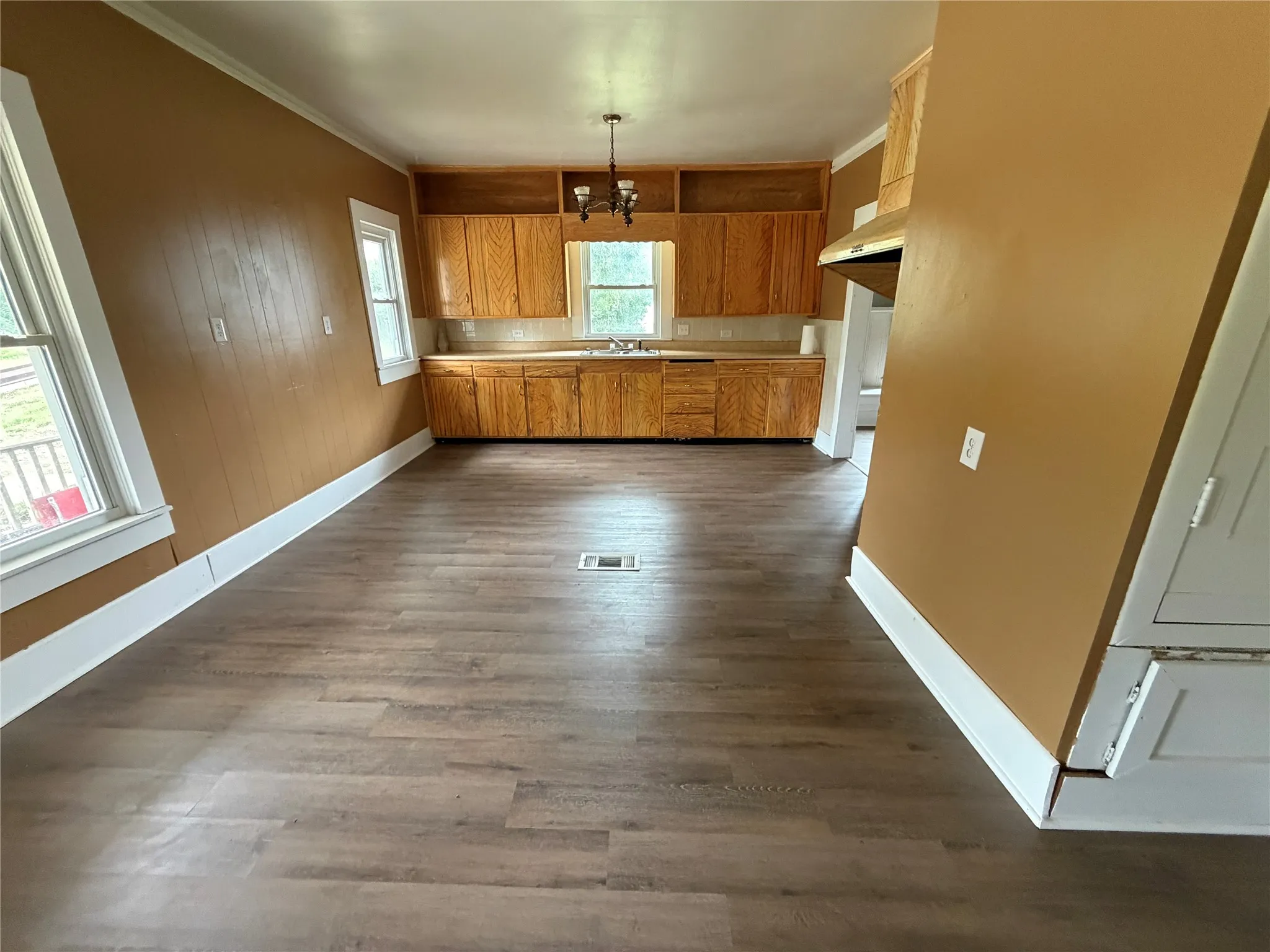 Large kitchen area with room to add an island or a breakfast area.