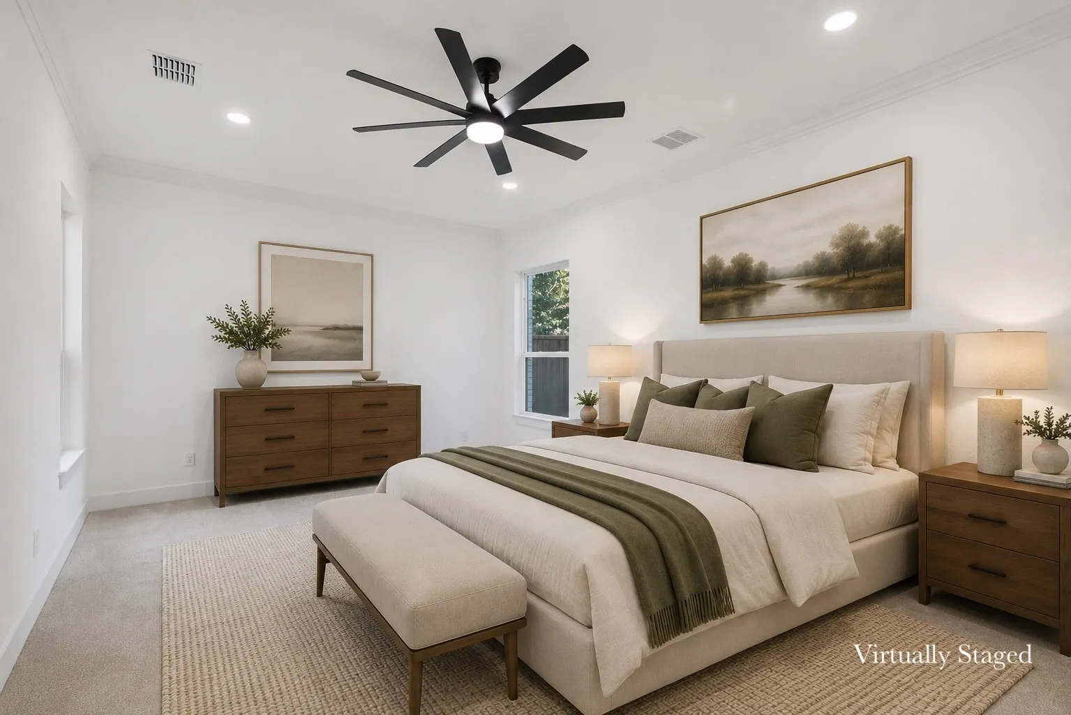 Bright room featuring neutral carpeting and recessed lighting