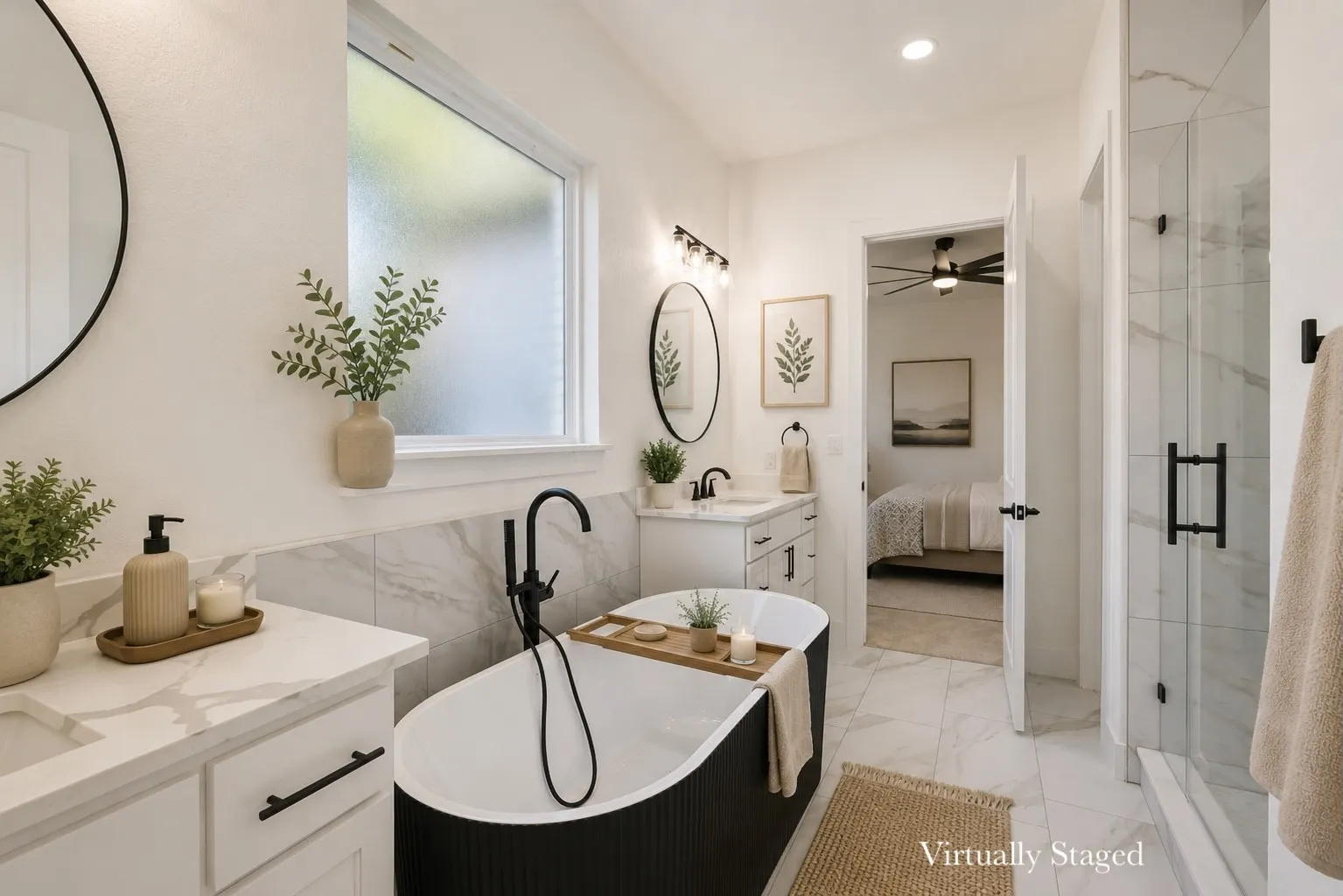 Contemporary bathroom featuring a freestanding soaking tub with a floor-mounted matte black faucet