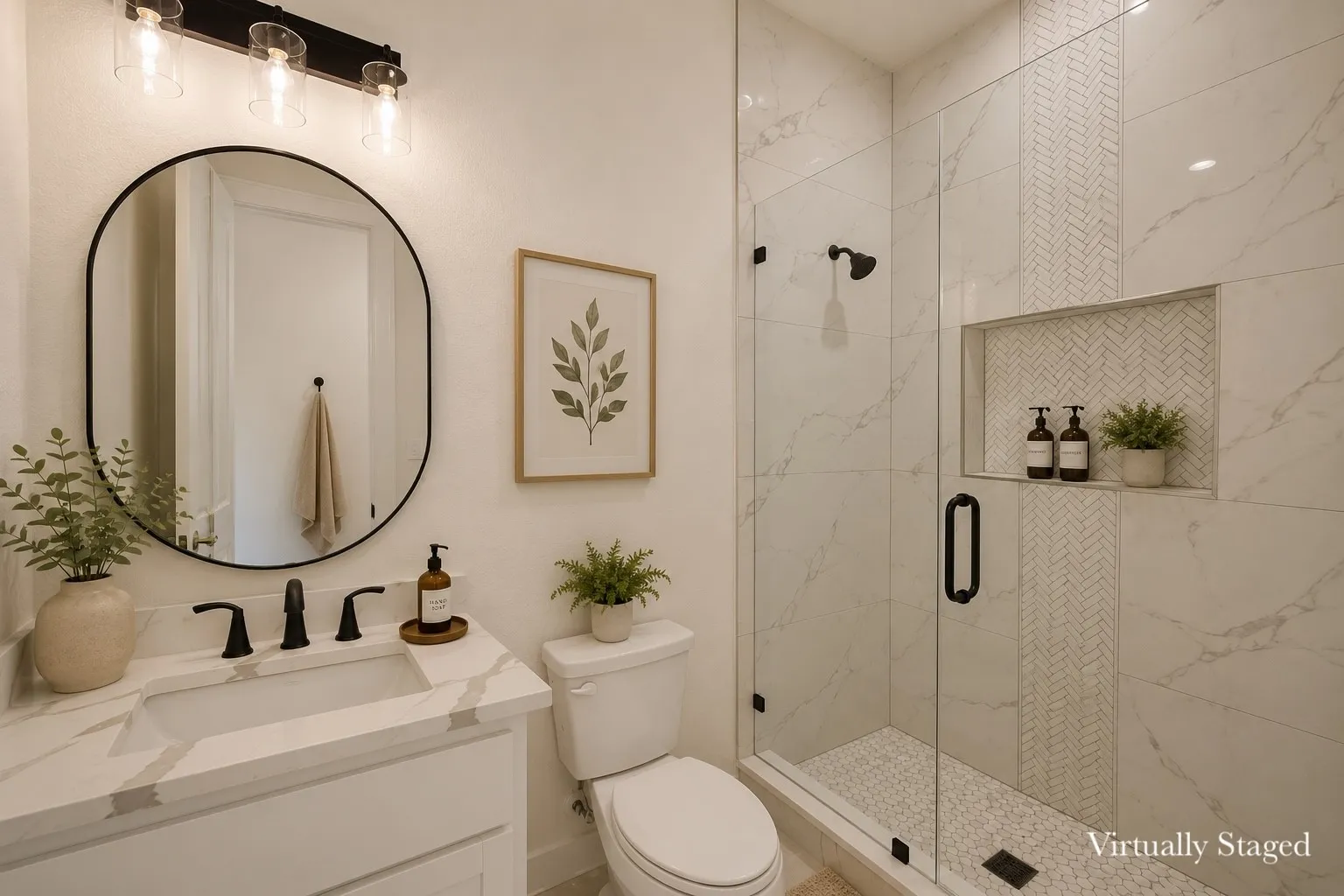 Bathroom featuring a glass-enclosed shower with a herringbone tile accent, a vanity with a white countertop and rectangular sink, a black framed oval mirror, and matte black fixtures