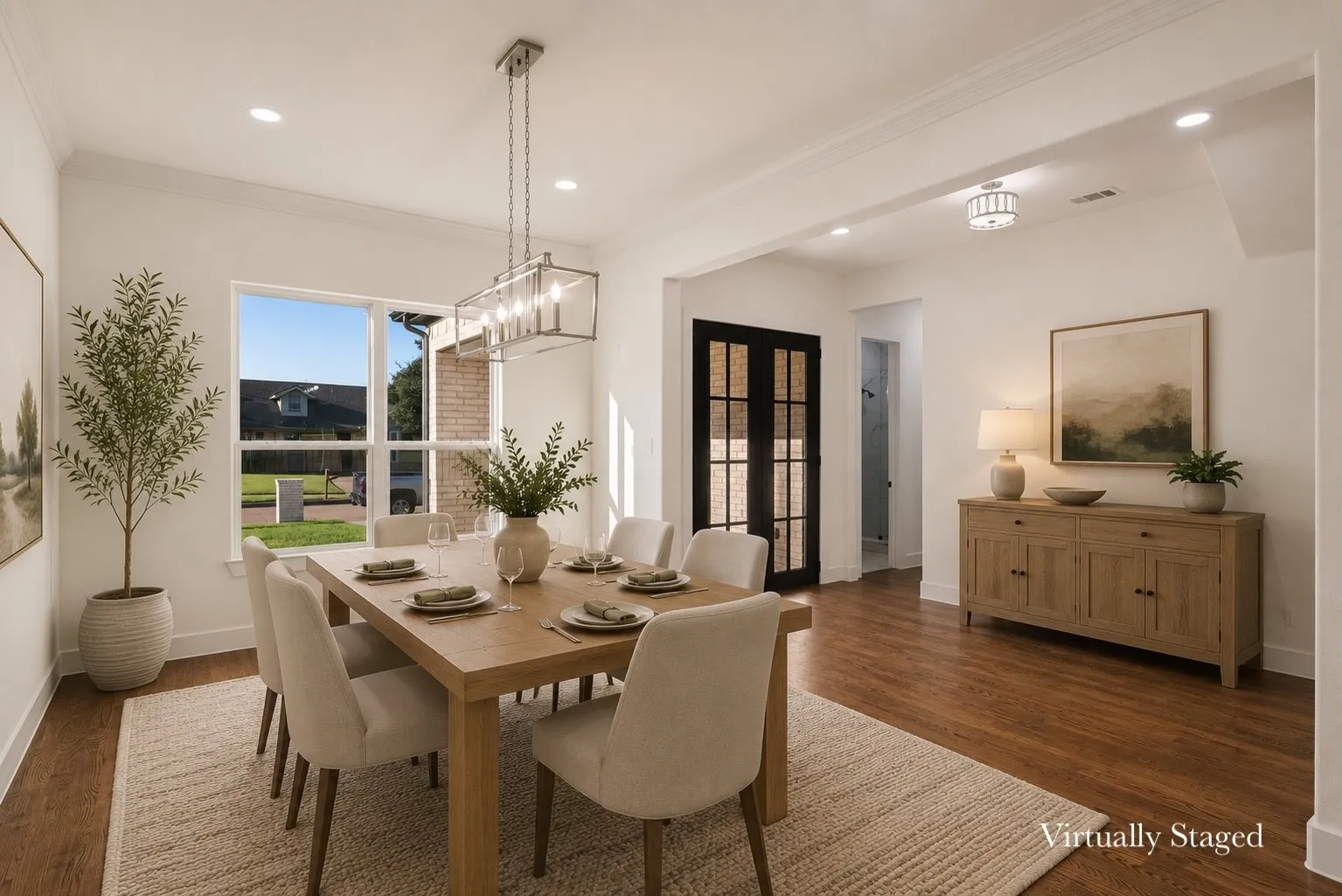 Dining area featuring wood-finish flooring, white walls, and a recessed lighting package