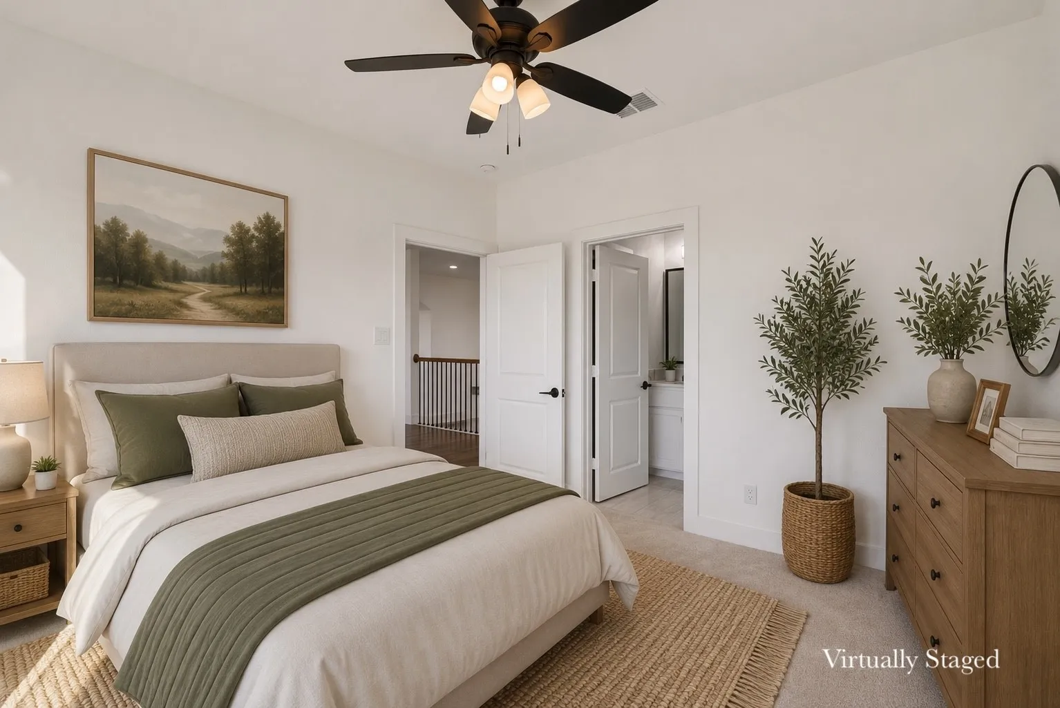 Carpeted room featuring a ceiling fan with integrated lighting, white walls, and a doorway opening to a bathroom with a vanity and mirror