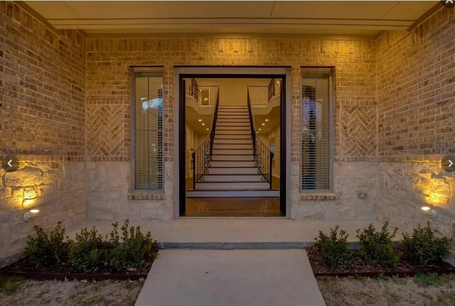 Brick and stone exterior with decorative brickwork accents