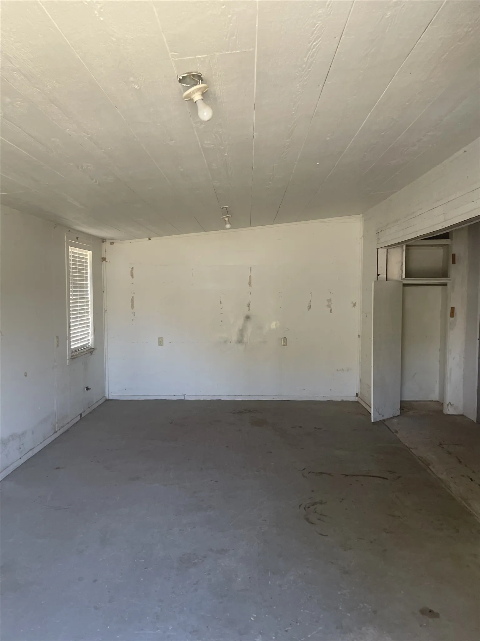 inside  garage attached to the shop