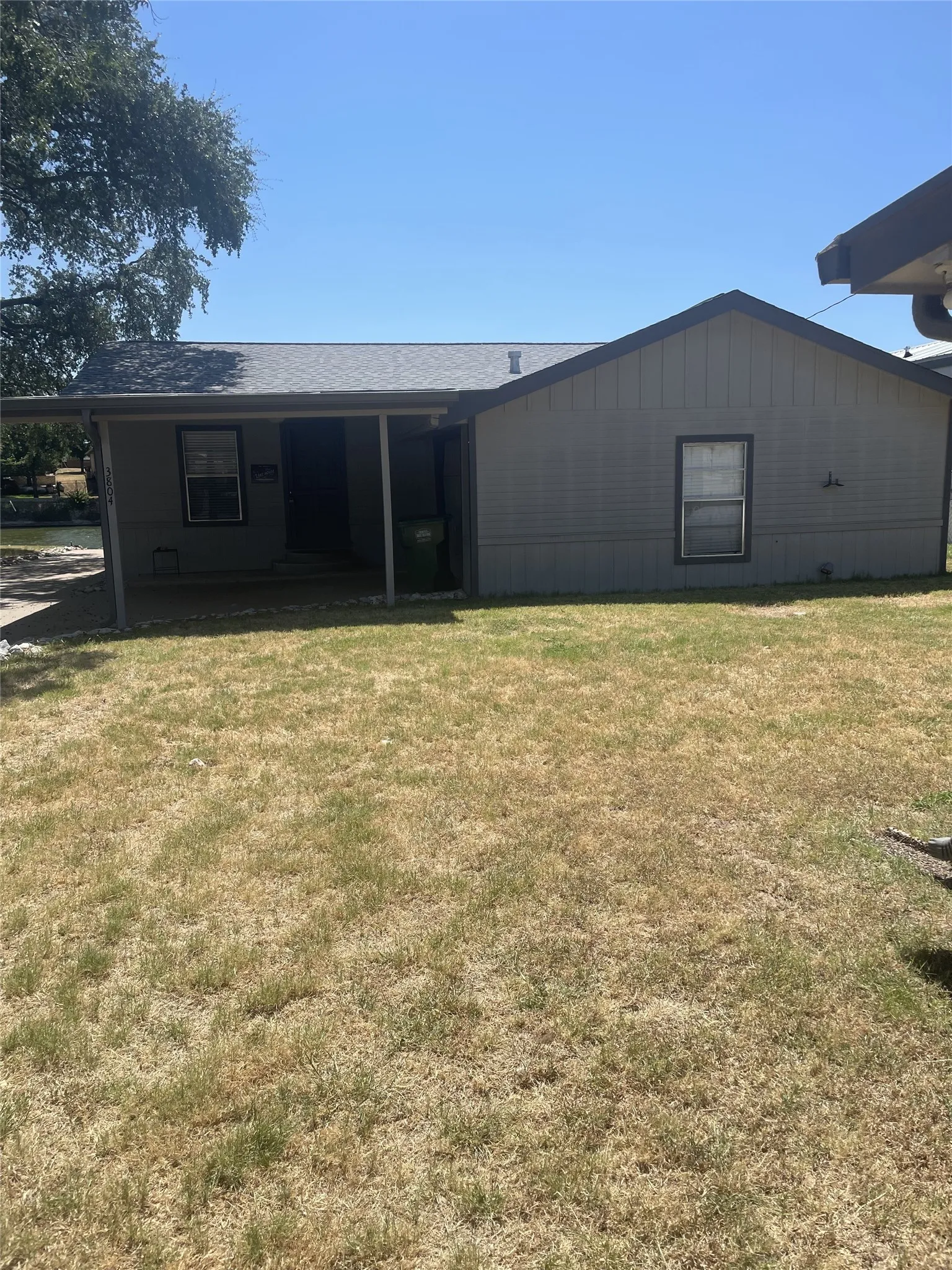 front of the home. arport and attahed garage