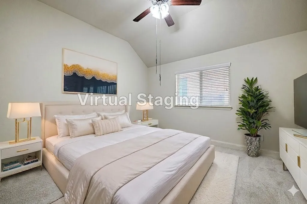Vaulted ceiling bedroom featuring a ceiling fan, carpet flooring, and a window with blinds