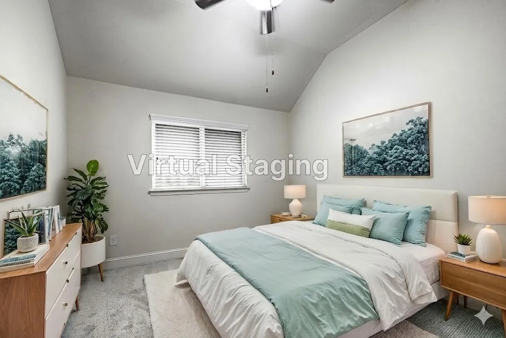 Bedroom featuring vaulted ceilings, light-colored walls, a ceiling fan with light fixture, a window with blinds, and carpeting